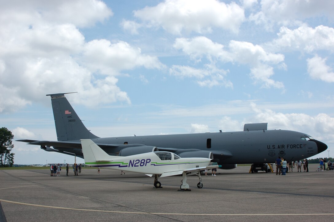 One of the civilian aircraft from EAA Chapter 166 is dwarfed by the USAF KC-135 out of McConnell AFB, Kan. during a Space and Aviation Day open House at Bradley ANG Base, East Granby, Conn. July 18, 2009. (U.S. Air Force photos by Tech. Sgt. Joshua Mead)