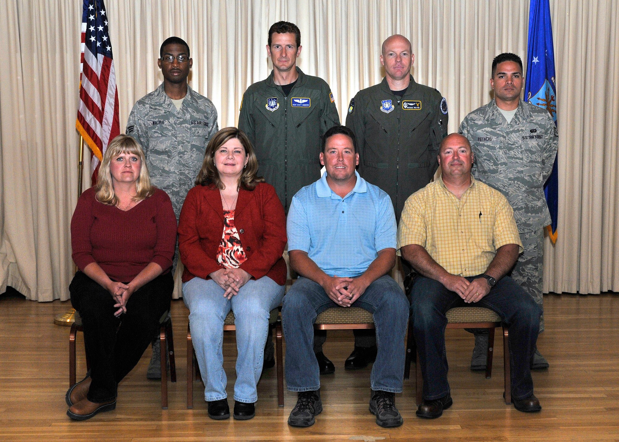 The Second Quarter 2009 award winners for Malmstrom were announced at a breakfast in their honor at the Grizzly Bend Club July 21.  Pictured are (seated left to right): Valerie Kraenzel, Civilian Category I; Carolyn Coke, Civilian Category II; Kelly Fletcher, Civilian Supervisory Category I; and John Edmonston, Civilian Supervisory Category II.  Standing (left to right) are: Senior Airman Oren Walker, Airman of the Quarter; Master Sgt. Scott Andrews, Senior NCO of the Quarter; Capt. Michael Melton, Company Grade Officer of the Quarter; and Staff Sgt. Kwinton Estacio, Honor Guard member of the quarter.  Not pictured but also selected are Staff Sgt. Christopher Stephens, NCO of the Quarter; and the 341st Civil Engineer Squadron Pollution Prevention Team, Professional Team of the Quarter.  (U.S. Air Force photo/John Turner)