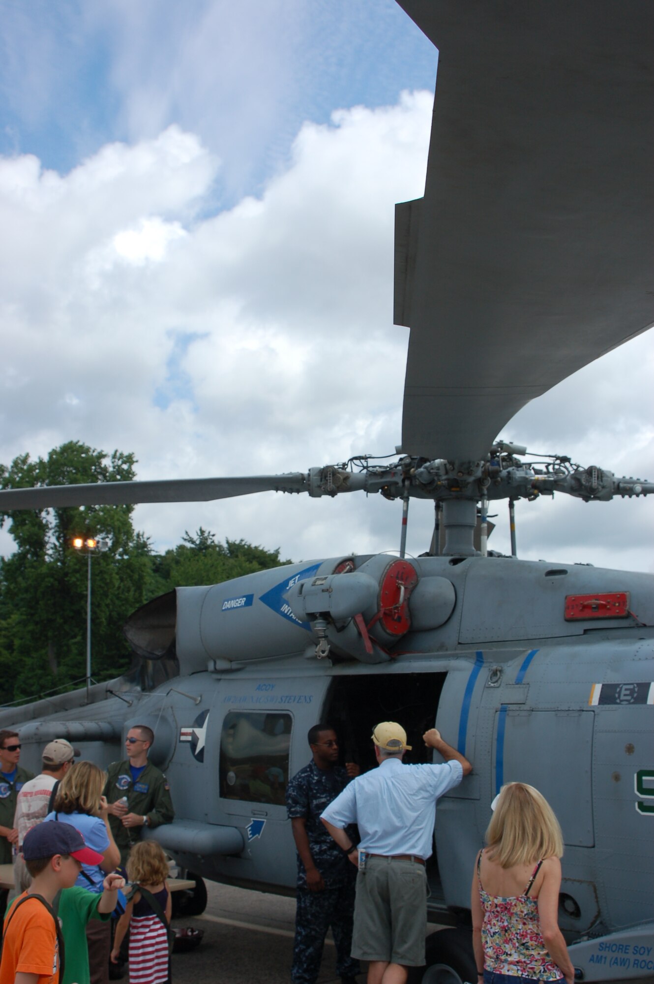 Visitors check out an SH-60R “Seahawk” at an open house at Bradley ANG Base, East Granby, Conn. as part of the annual Space and Aviation Day event July 18, 2009.  (U.S. Air Force photo by Tech. Sgt. Josh Mead)