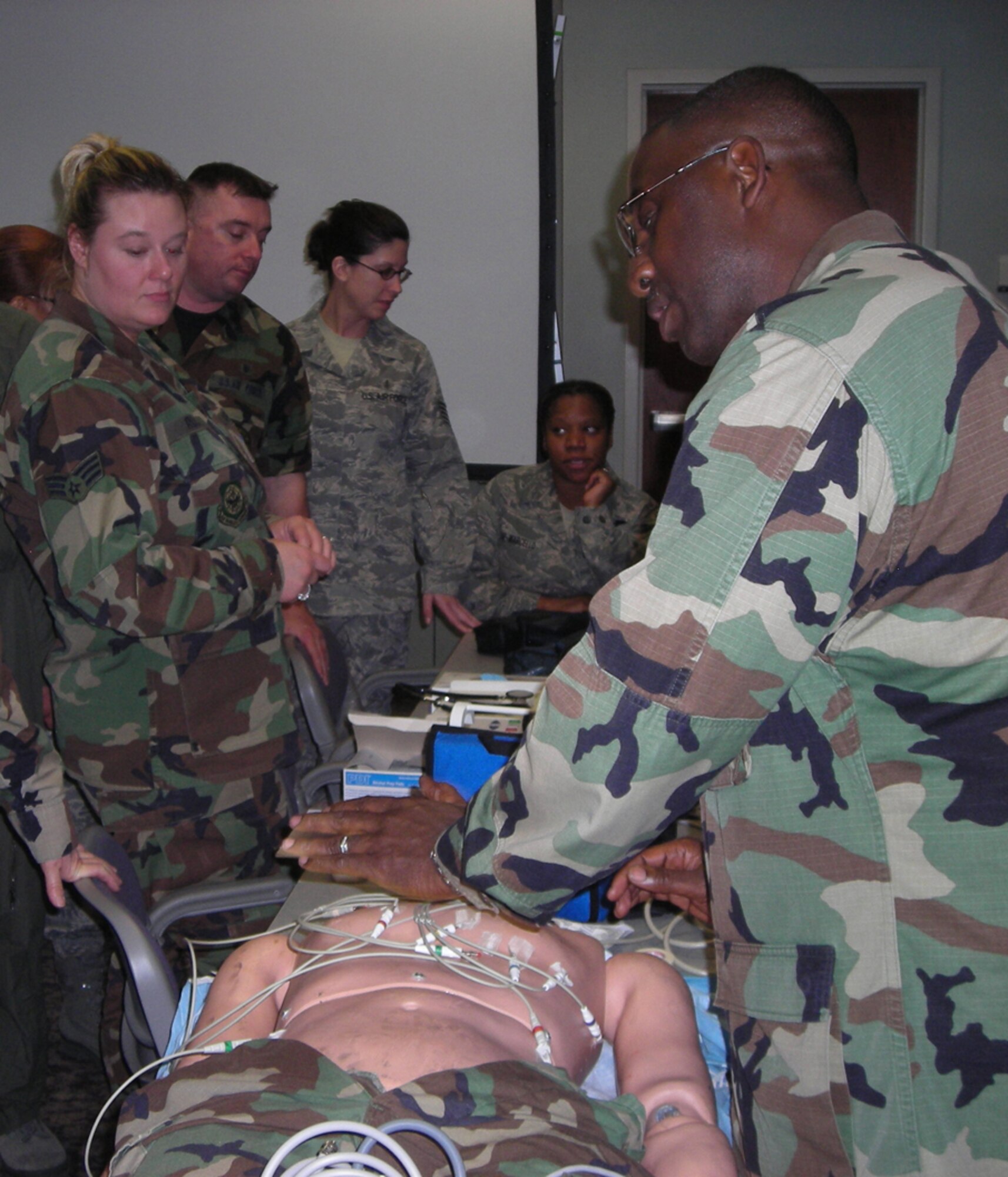 Members of the 932nd Medical Group recently completed their annual readiness training by holding a Training Rodeo, which included lifesaving skills. The event was a departure from past events because it focused on skills needed to accomplish the patient movement mission instead of only setting up and running patient care
events.  (U.S. Air Force photo submitted by Maj. Sue Drabing)