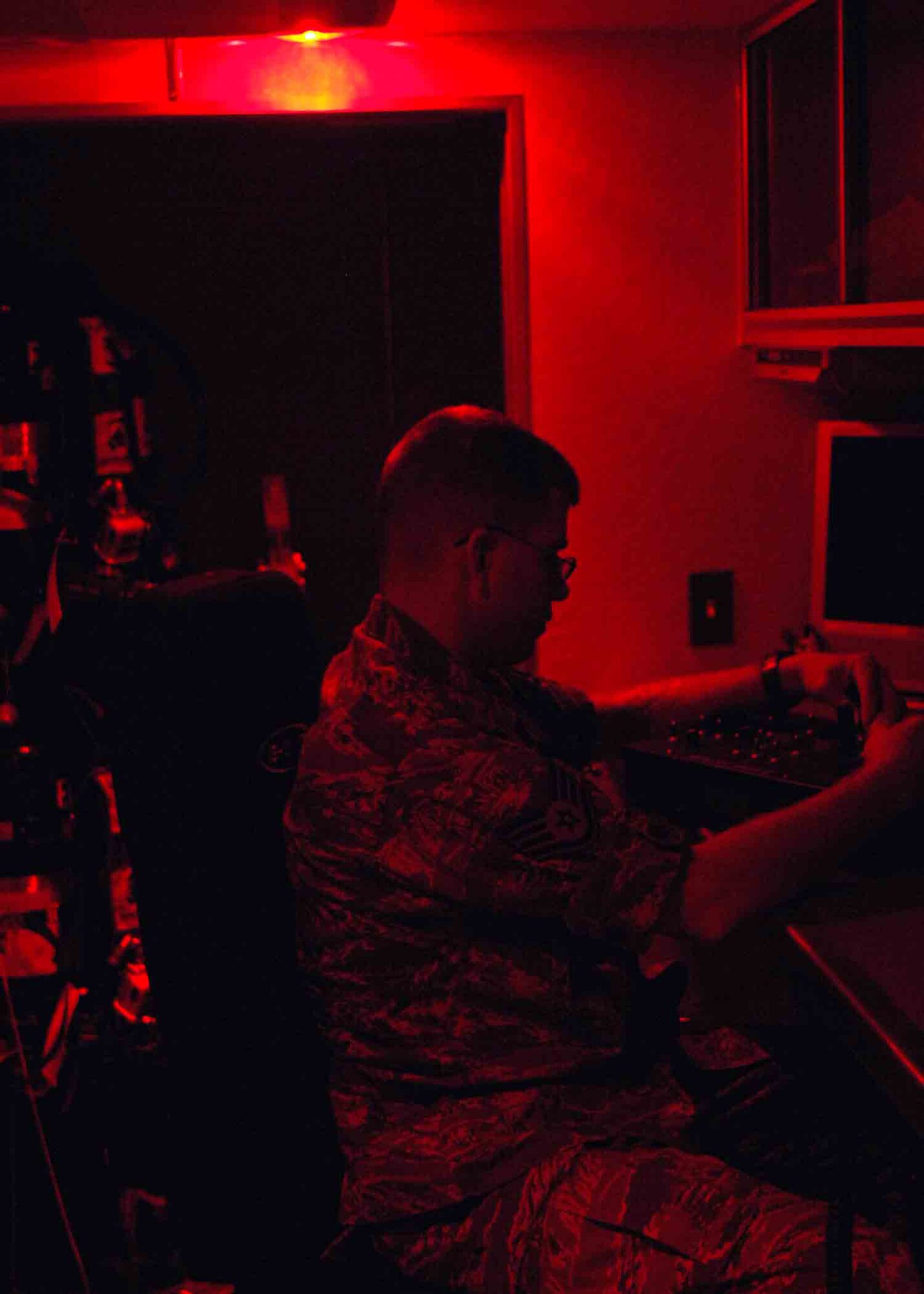 CANNON AIR FORCE, N.M. -- Staff Sgt. David Olson, 27th Special Operations Civil Engineer Squadron Explosive Ordnance Disposal member, operates an HD-1 remote entry robot from within a bomb squad emergency response vehicle July 29.  The EOD flight responds to both on and off-base calls, and provides its expertise to areas in New Mexico and parts  Texas Panhandle.  (U.S. Air Force photo by Airman 1st Class James Bell)