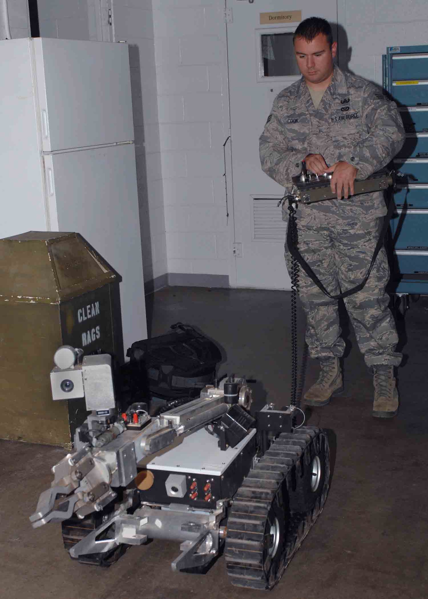 CANNON AIR FORCE BASE, N.M.?Senior Airman Michael Cook, 27th Special Operations Civil Engineer Squadron Explosive Ordnance Disposal member, operates the HD-1 remote entry robot on base July 29.  HD-1 are modeled robots, made by Remotech Andros, that assist in remote-entry situations and help keep danger at a distance.  (U.S. Air Force photo by Airman 1st Class James Bell) 