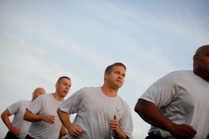 MOODY AIR FORCE BASE, Ga. -- 93rd Air Ground Operations Wing Airmen participate in a formation run with Brig. Gen. Michael Longoria, 93rd AGOW commander, to celebrate his last full day as commander of the 93rd AGOW here July 30. (U.S. Air Force photo by Senior Airman Gina Chiaverotti-Paige)