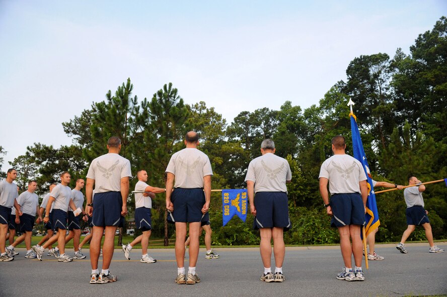 MOODY AIR FORCE BASE, Ga. -- Brig. Gen. Michael Longoria, 93rd Air Ground Operations Wing commander, salutes Airmen during a pass and review, prior to the start of a two-mile formation run here July 30. General Longoria will retire from the Air Force after 30 years of service following his change of command ceremony held on July 31. (U.S. Air Force photo by Senior Airman Gina Chiaverotti-Paige)