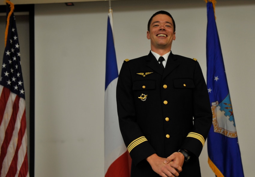 MOODY AIR FORCE BASE, Ga. -- Capt. Guillaume Vernet, a French pilot assigned to the 41st Rescue Squadron, speaks to the audience during his promotion ceremony here July 31. Captain Vernet was promoted to the rank of major during the ceremony and is a part of a three-year officer exchange program. (U.S. Air Force photo by Senior Airman Schelli Jones)