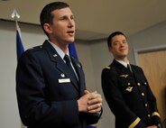 MOODY AIR FORCE BASE, Ga. -- Lt. Col. Thomas Kunkel, 41st Rescue Squadron commander, speaks to the audience here July 31, during a promotion ceremony held for Capt. Guillaume Vernet, an HH-60G PaveHawk pilot assigned to the 41st RQS. Captain Vernet is a French pilot and is a part of a three-year officer exchange program. (U.S. Air Force photo by Senior Airman Schelli Jones)