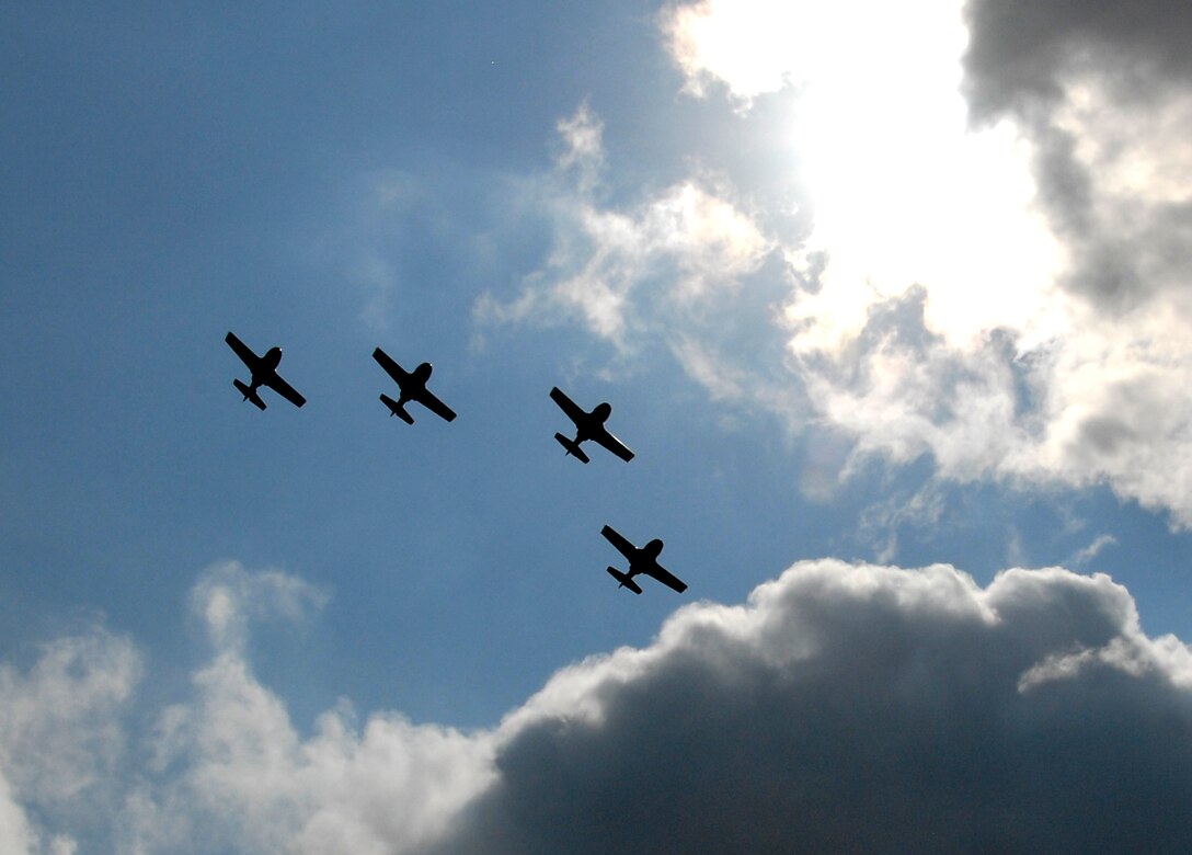 Four of the last seven T-37B Tweets perform a flyover July 31 during a ceremony that officially retired the primary trainer from Sheppard Air Force Base, Texas, and the Air Force. The durable and reliable Tweet served as the introductory pilot training aircraft for more than half a decade. (U.S. Air Force photo/Mike Litteken)