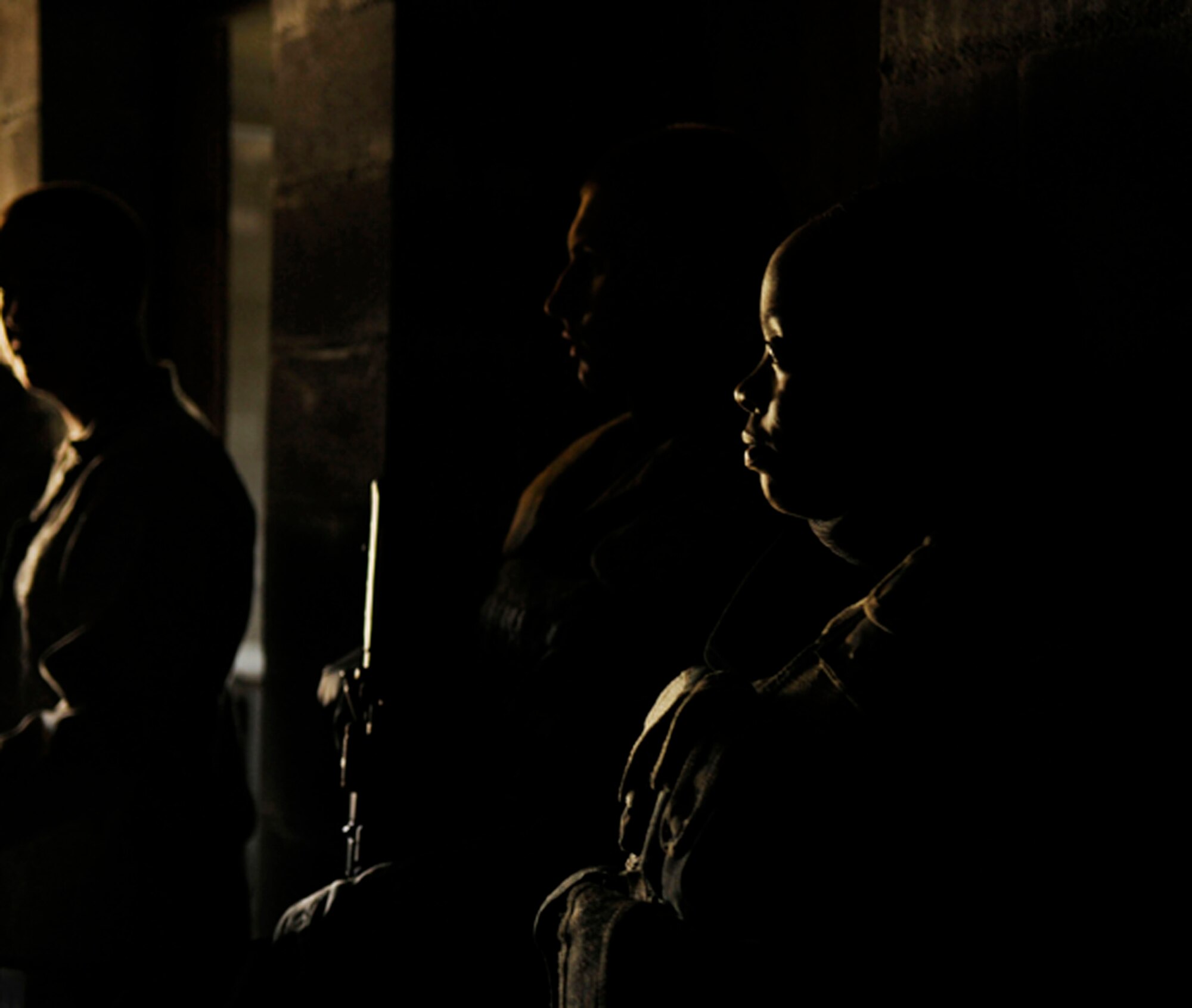 Airman 1st Class Kamisha Thomas pauses to rest during an exercise July 21, 2009, Fort Wainwright, Alaska. The Active Shooter exercise trains Security Forces Airmen how to neutralize threats within 90 seconds of entering a building. Airman Thomas is with the 354th Security Forces Squadron. (U.S. Air Force photo/Airman 1st Class Laura Goodgame)
