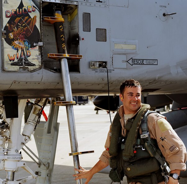 MOODY AIR FORCE BASE Ga. -- Capt. Joseph Runci, 74th Fighter Squadron A-10C Thunderbolt II pilot, climbs down from his aircraft here July 30. Captain Runci returned to his wife and son after a five-month deployment to Afghanistan. (U.S. Air Force photo by Airman 1st Class Joshua Green)