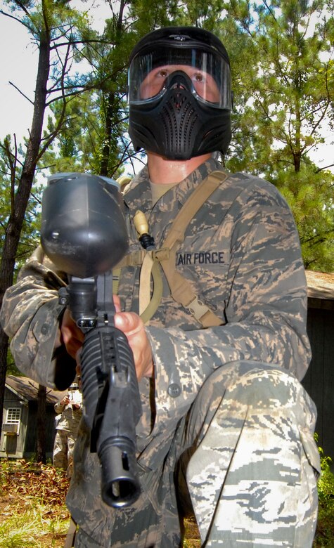 New second lieutenants attending Maxwell's Air and Space Basic Course are shown in different phases of field training on Lake Jordan as part of Vigilant Warrior. Learning the skills to operate in an expeditionary environment, they are armed with "simulated M-4 marker sets," or paint guns and learn land navigation, small unit tactics and integrated base defense. (U.S. Air Force photo/Donna Burnett)