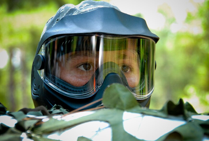 New second lieutenants attending Maxwell's Air and Space Basic Course are shown in different phases of field training on Lake Jordan as part of Vigilant Warrior. Learning the skills to operate in an expeditionary environment, they are armed with "simulated M-4 marker sets," or paint guns and learn land navigation, small unit tactics and integrated base defense. (U.S. Air Force photo/Donna Burnett)