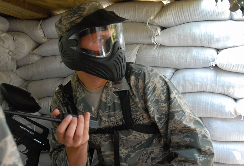 New second lieutenants attending Maxwell's Air and Space Basic Course are shown in different phases of field training on Lake Jordan as part of Vigilant Warrior. Learning the skills to operate in an expeditionary environment, they are armed with "simulated M-4 marker sets," or paint guns and learn land navigation, small unit tactics and integrated base defense. (U.S. Air Force photo/Donna Burnett)