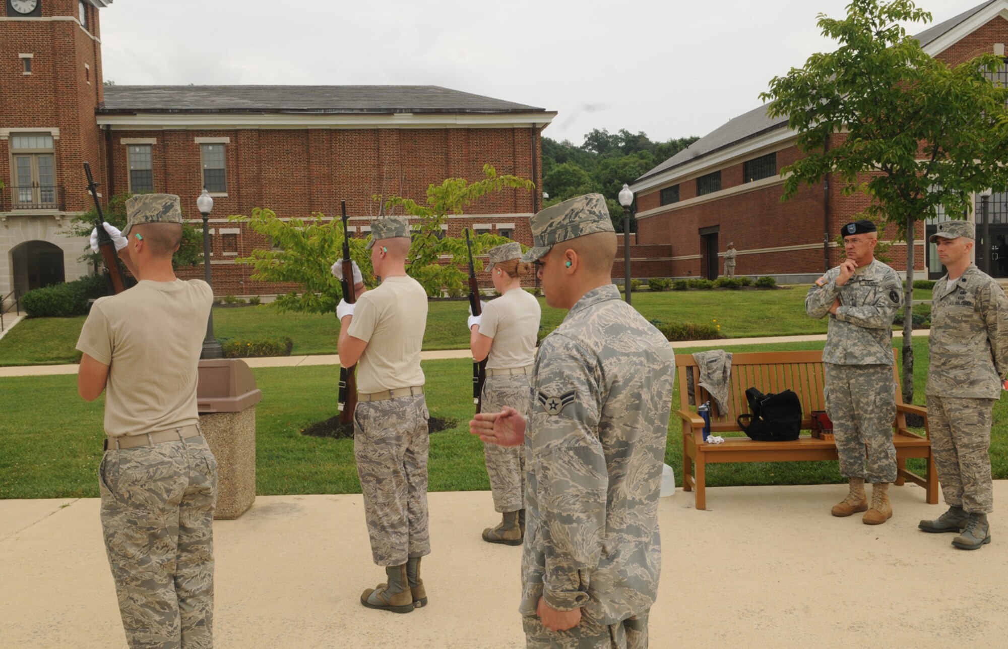 Brig. Gen. Karl Horst, Military District of Washington commander, and Lt. Col. Raymond Powell, United States Air Force Honor Guard commander admire the precision of the United States  Air Force Honor Guard firing party. General Horst came for an orientation tour of Air Force District of Washington’s assets on Bolling Air Force Base, July 29. (U.S. Air Force photo by Senior Airman Sean Adams)