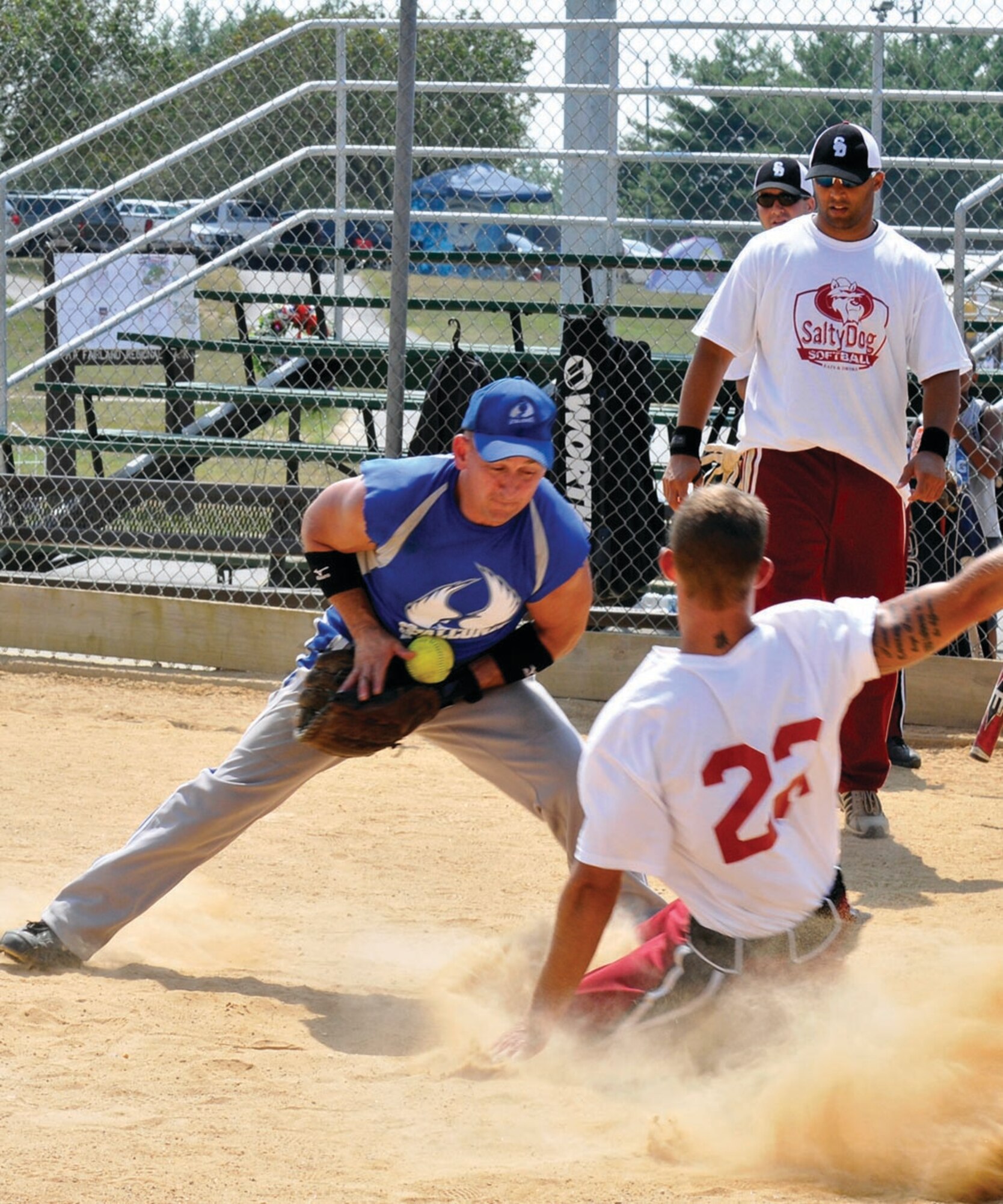 Brian Spurlock, Andrews Falcons member, attempts to tag out Theodore Szerszenski, a member of the Navy Salty Dogs, during the U.S. Specialty Sports Association military state championship game held in Laurel, Md., Saturday. The Falcons won third overall, and will continue on to compete in the USSSA Military World Tournament in Panama City Beach, Fla., next month. (U.S. Air Force photo/ Senior Airman Renae Kleckner)