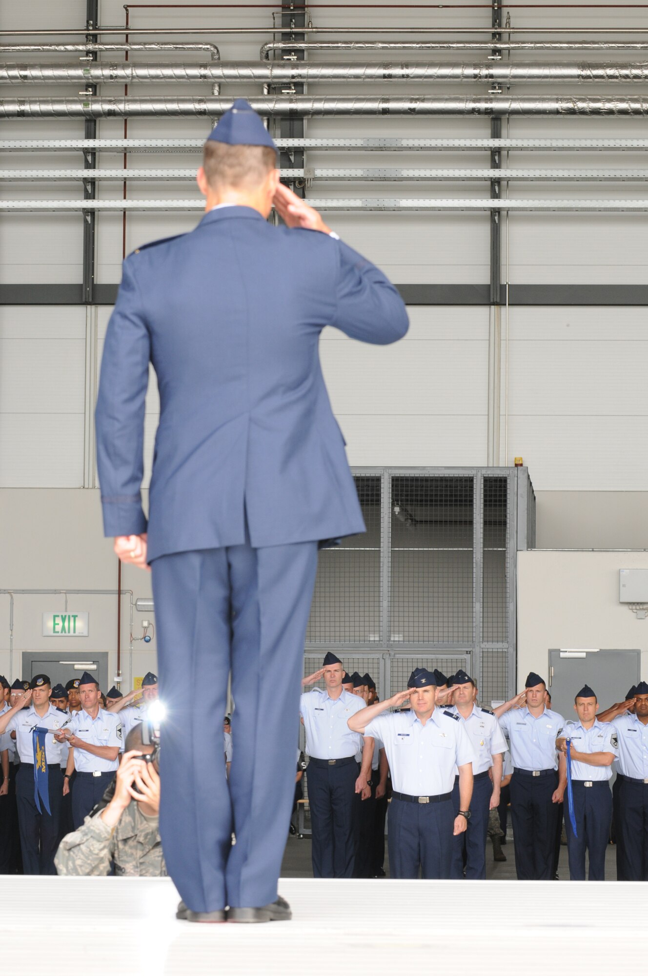 U.S. Air Force Col. Mark Dillon salutes the members of the 86th Airlift Wing on Ramstein Air Base for the first time as the new wing commander.  Colonel Dillon, Brig. Gen. select, assumed command from Brig. Gen. William Bender on July 31, 2009. (U.S. Air force photo By: Tech. Sgt. Sean Mateo White)