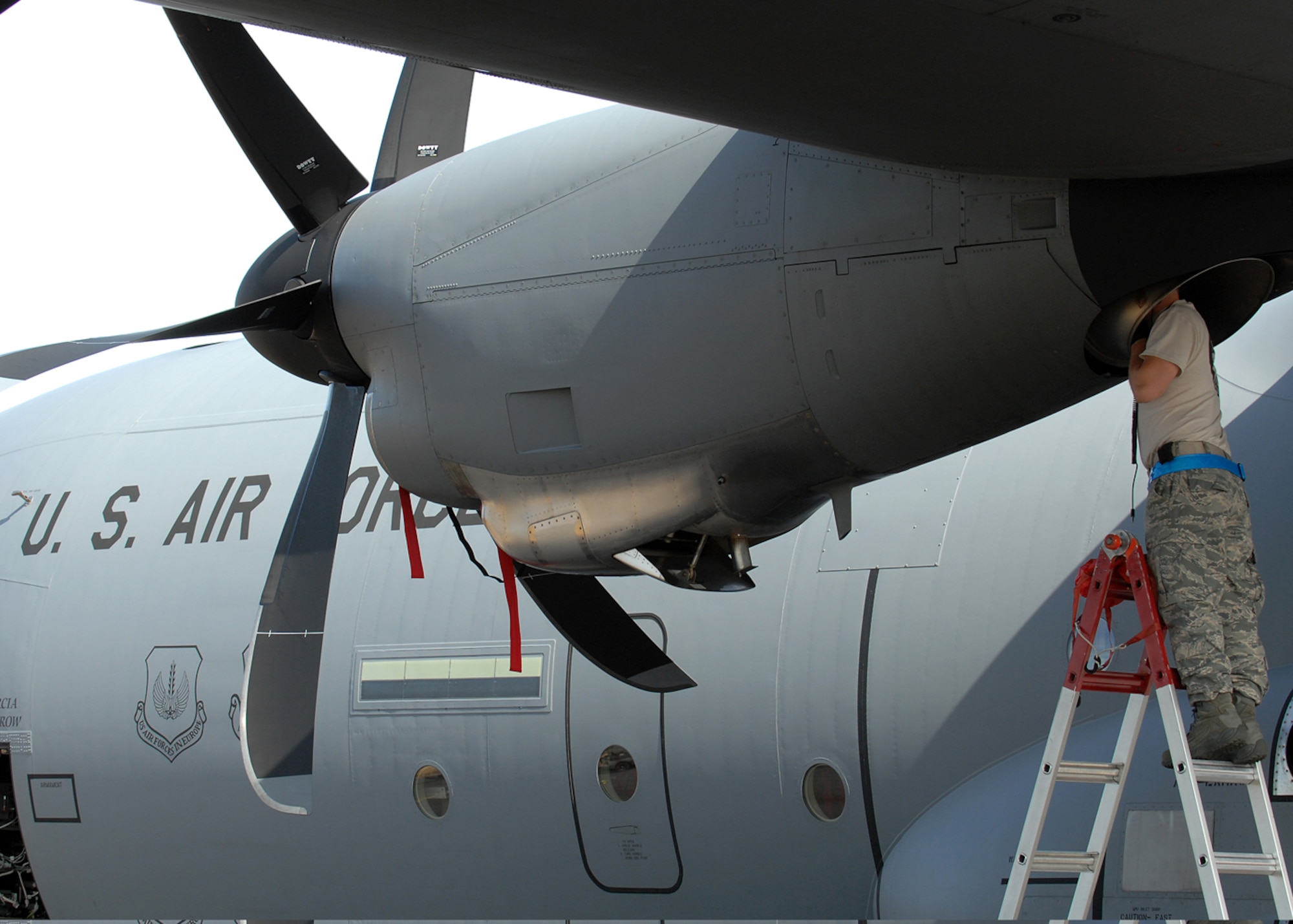 Tech. Sgt. Craig Arbugast, from the 86th Air Wing, Ramstein Air Base, Germany, performs an intake and exhaust inspection on a C-130 Hercules aircraft at McChord Air Force Base, Wash., July 18, 2009, before the beginning of Air Mobility Command Rodeo 2009. More than 50 Airmen from Team Ramstein were part of the 2,500 servicemembers from around the Air Force and the globe participating in the rodeo. The competition, which went from Jul 19 to 24, is a bi-annual mobility readiness exercises that brings teams together to compete in more than 50 judged events spanning the categories of aerial port, aeromedical evacuation, aircrew, fit to fight, maintenance and security forces.   (U.S. Air Force photo by Staff Sgt. Stephen Schester) 