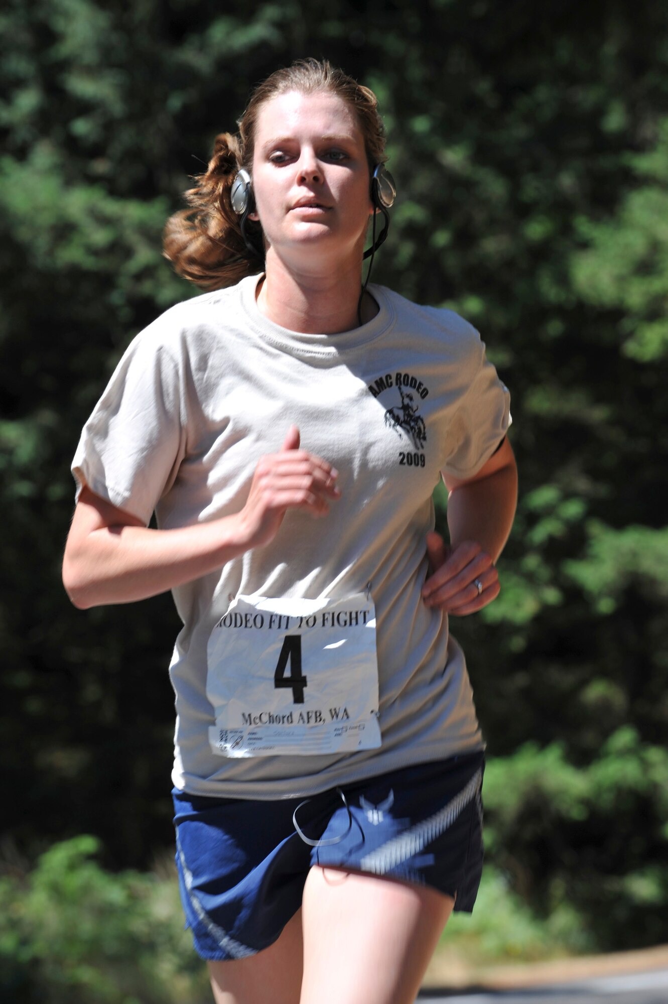 Capt. Sarah Santoro, 37th Airlift Squadron, participates in the 1.5-mile run as part of the Air Mobility Rodeo competition at McChord Air Force Base, Wash. Team Ramstein members from the 86th Airlift Wing placed 4th of 54 teams during the Fit to Fight competition. More than 50 Airmen from Team Ramstein were part of the 2,500 servicemembers from around the Air Force and the globe participating in the rodeo. The competition, which went from Jul 19 to 24, is a bi-annual mobility readiness exercises that brings teams together to compete in more than 50 judged events spanning the categories of aerial port, aeromedical evacuation, aircrew, fit to fight, maintenance and security forces.  (Courtesy photo).