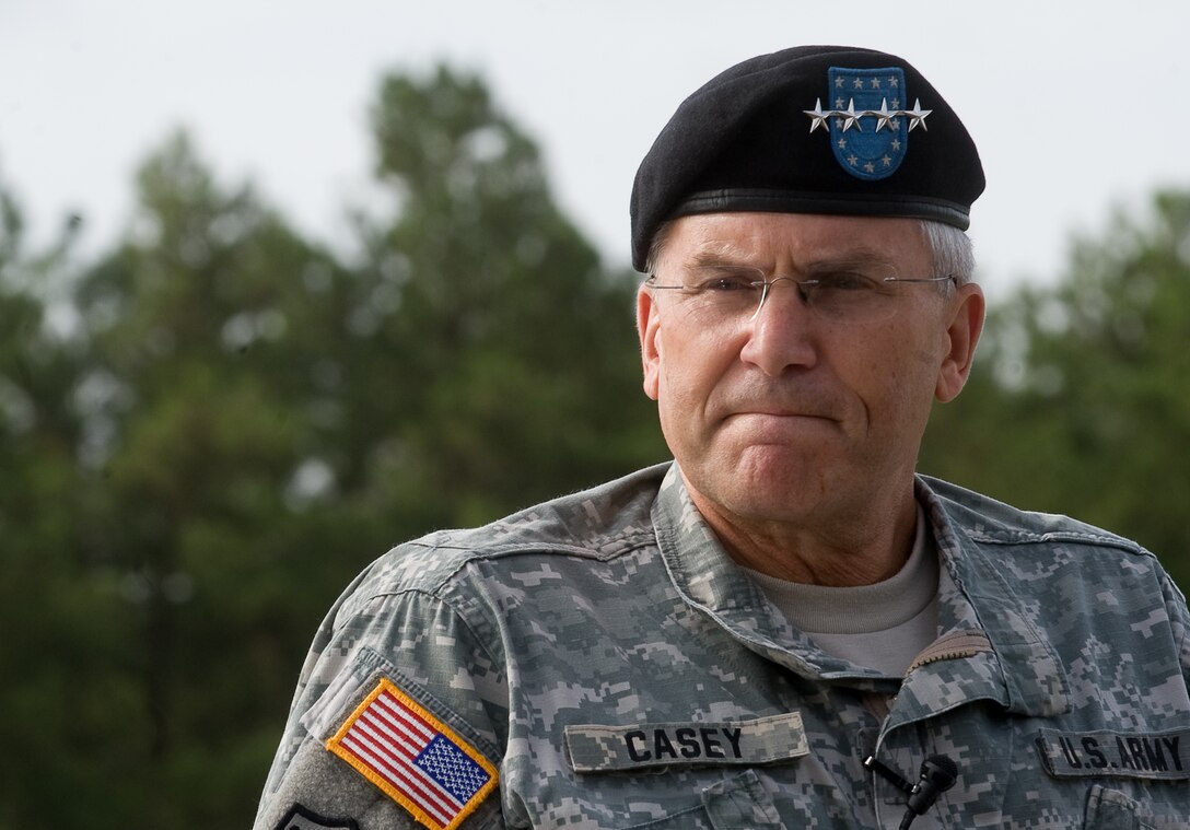 Chief of Staff of the Army Gen. George W. Casey Jr., observes a class of new soldiers as they begin the basic training ceremony on "Family Day" at Fort Jackson, S.C., July 30, 2009.  Family day is when soldiers are able to meet up with their families for the first time since starting basic training.
