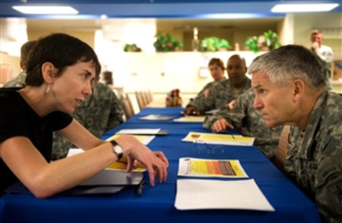 Dr. Amy Adler of the Walter Reed Army Institute of Research briefs Chief of Staff of the Army Gen. George W. Casey Jr. on the application of Battlemind training to the recruits at Fort Jackson, S.C., on Jul. 30, 2009.  Battlemind is training that is designed to build resiliency in soldiers.  