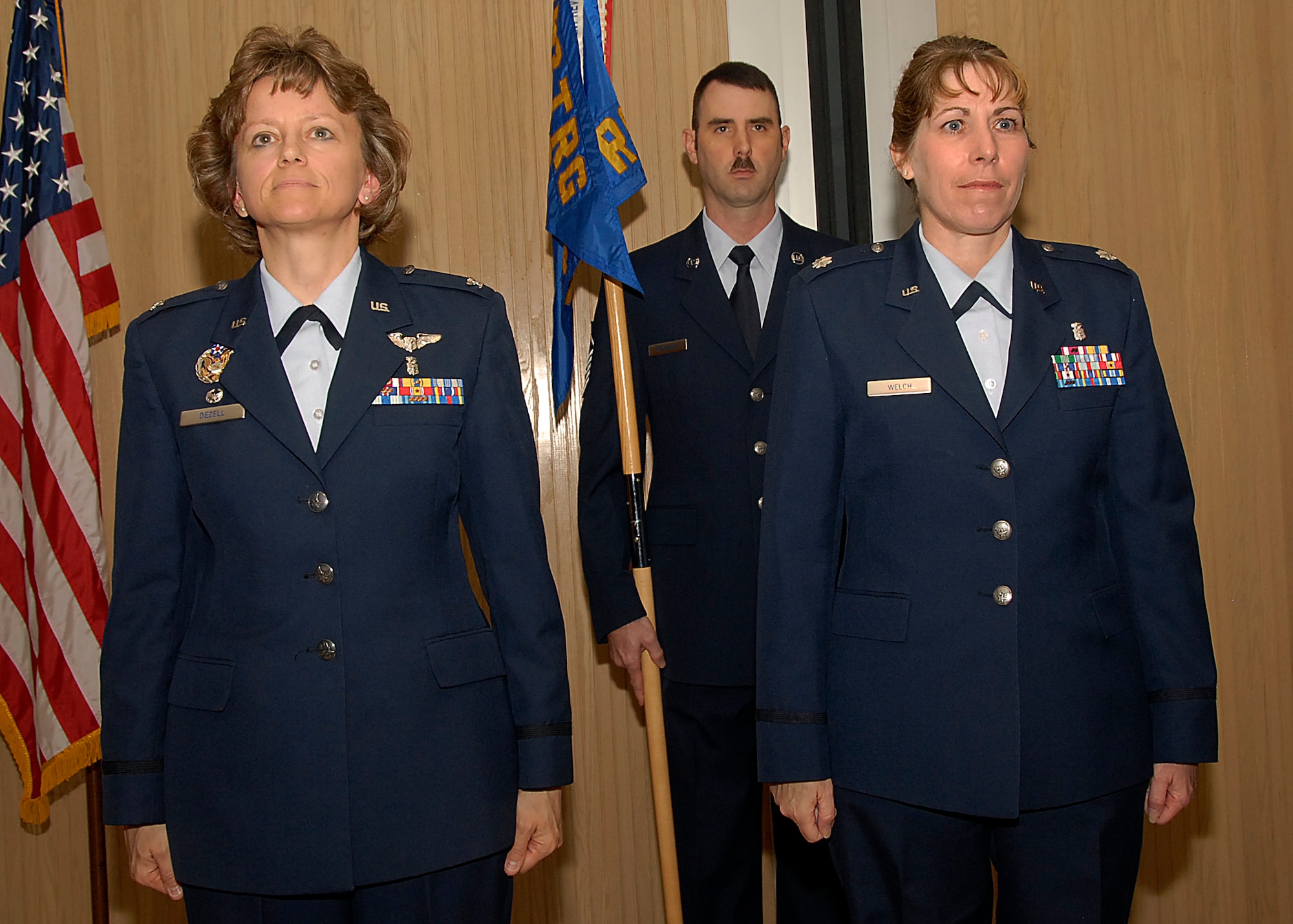 Commander of the 882nd Training Group Col. Nancy Dezell and  Lt. Col. Patricia Welch, incoming 382nd Training Squadron commander, perform the squadron's change of command ceremony June 1 in Bldg. 1900. (U.S. Air Force photo/Harry Tonemah)