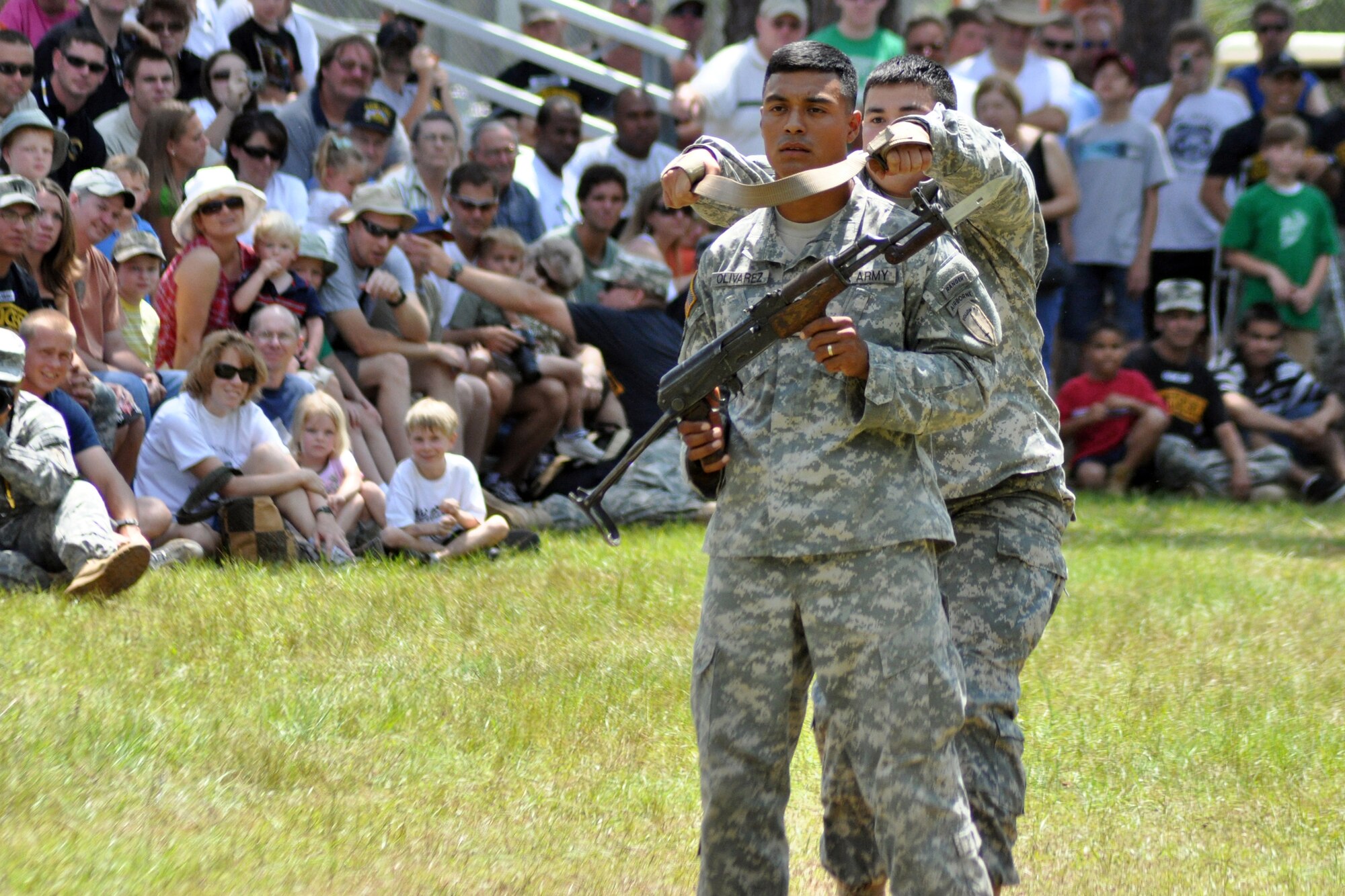 EGLIN AIR FORCE BASE, Fla. – Soldiers demonstrate hand-to-hand combat during the Army’s 6th Ranger Training Battalion open house May 30. The event was a chance for the public to witness how they train and operate in extreme situations. The event included a variety of displays such as dive equipment, weapons, and zodiac boats. Demonstrations featured at the event included hand-to-hand combat demonstration, parachute jump, and an urban operations demonstration. (U.S. Air Force photo/ Airman Anthony Jennings)
