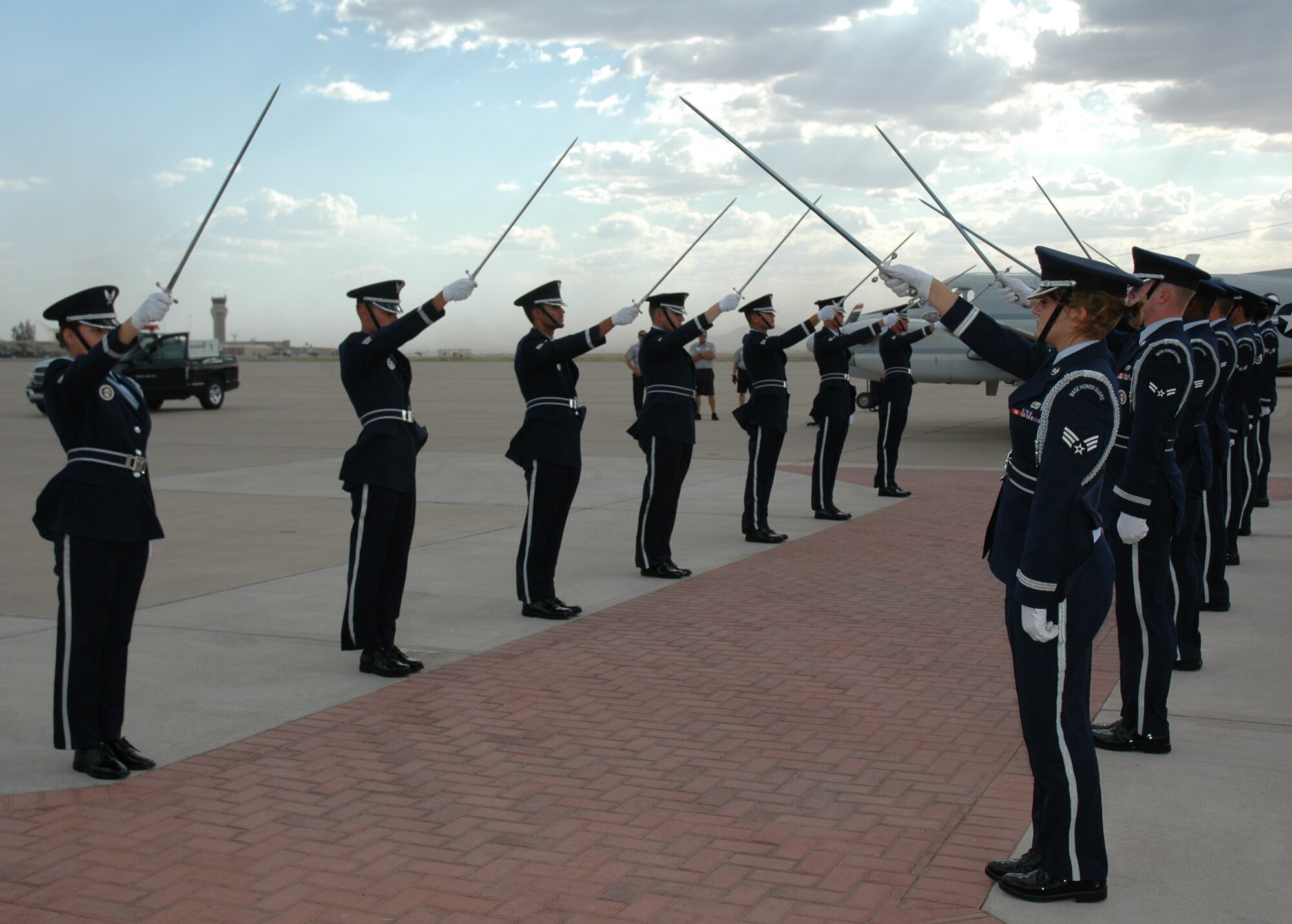 The Luke Air Force Base Honor Guard conduct a cordon for Lt. Gen. Charles Stenner Jr, Commander, Air Force Reserve Command, during his visit here May 28. General Stenner conducted a Warrior Call and also served as the presiding officer for the promotion ceremony of Maj. Gen. Roger Binder, mobilization assistant to the Commander, Air Combat Command, General Binder, a former member of the 944th Fighter Wing, chose the the wing as the site for his promotion to major general. General Binder and General Stenner both served in the 944th Fighter Wing in various command positions. (U.S. Air Force photo/Tech. Sgt. Susan Stout)