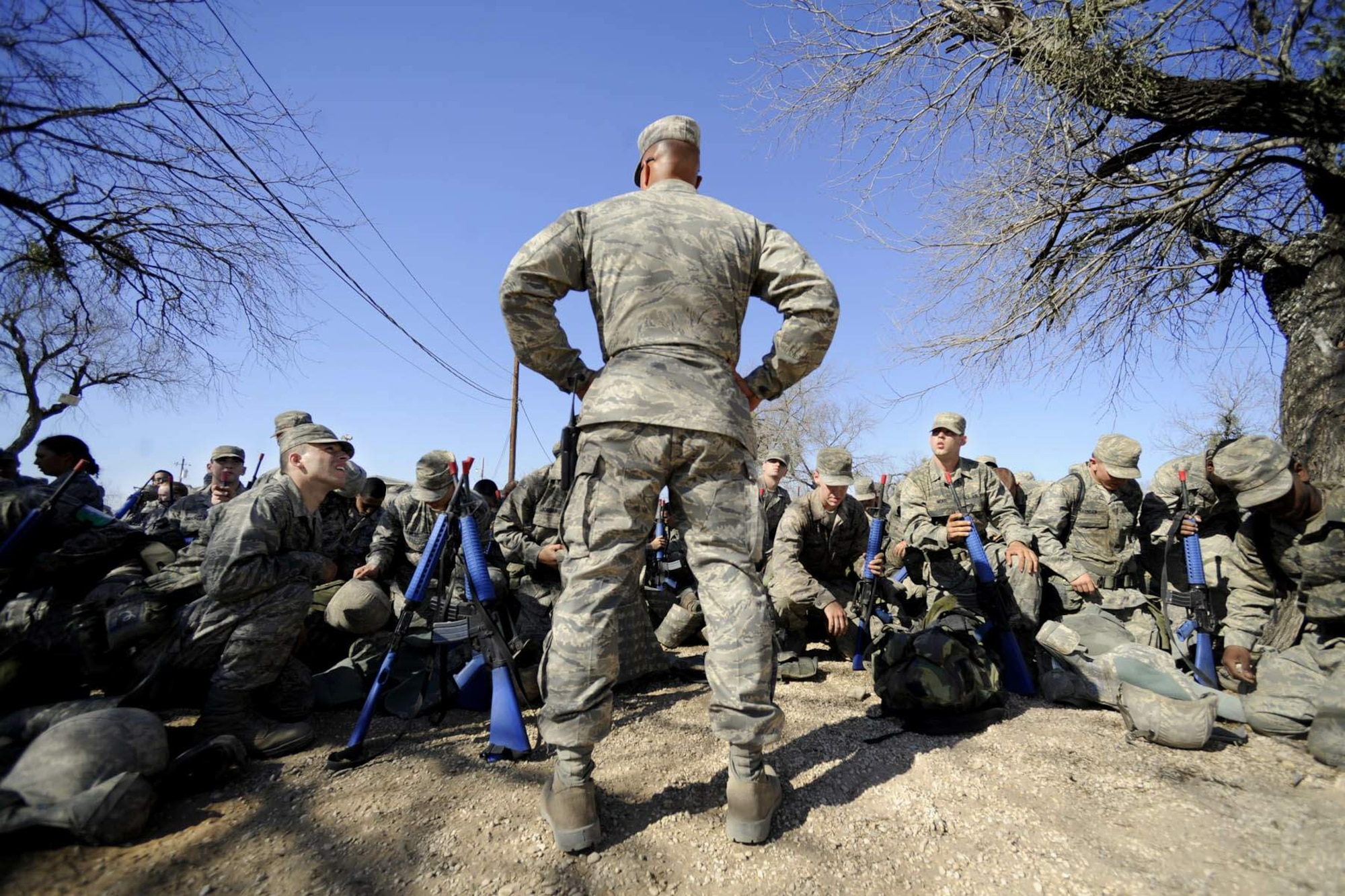 Master Sgt. Tim Burton, a military training instructor, holds the undivided attention of recruits at Lackland Air Force Base, Texas. Military training instructors now conduct an extended basic training program that runs eight-and-a-half weeks, two weeks longer than the previous program. (U.S. Air Force photo/Master Sgt. Cecilio Ricardo)
