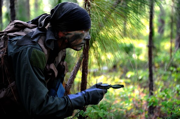 SHAW AIR FORCE BASE, S.C. - Senior Airman Justin Carson, 20th Fighter Wing Survival, Evasion, Resistance and Escape specialist, evades to a recovery site during training on Poinsett Range May 28, 2009. SERE Specialists train aircrew and high-risk personnel on how to employ personnel recovery techniques, tactics and procedures in many diiferant scenarios.  (U.S. Air Force photo/Senior Airman Matt Davis)