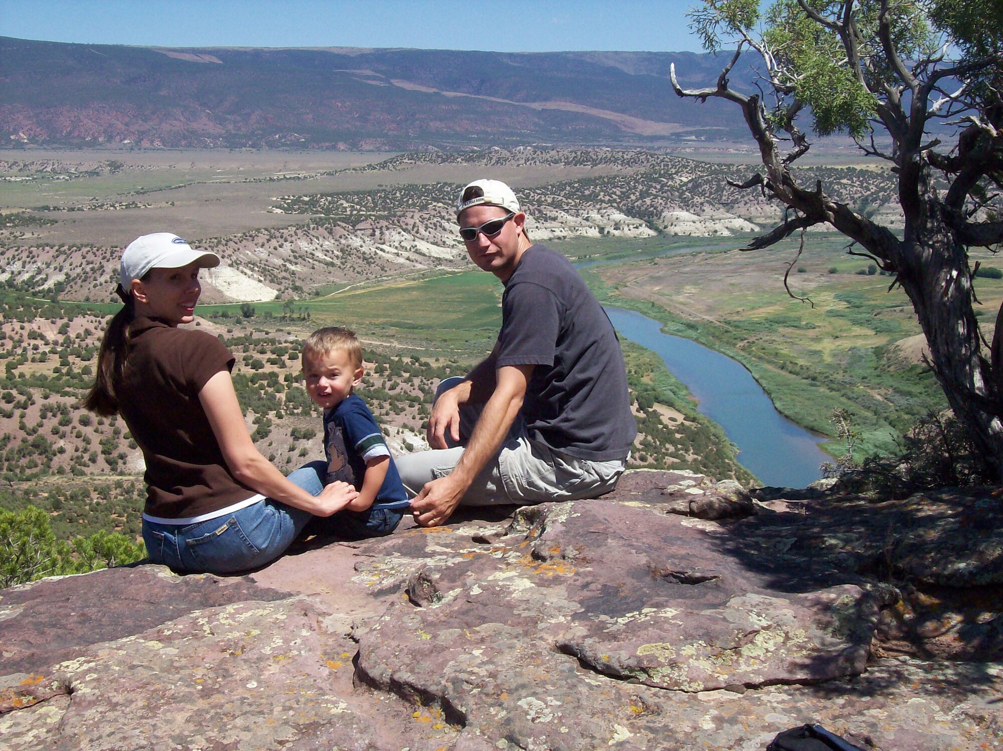 CANNON AIR FORCE BASE, N.M. -- Senior Airman Eric Slaugh, his wife Marcie, and his son Skyler enjoy the view of the Green River in Wyoming. Airman Slaugh, 27th Special Operations Component Maintenance Squadron, used his Self Aid and Buddy Care training to assist a man hit by a train in December 2008. (courtesy photo)