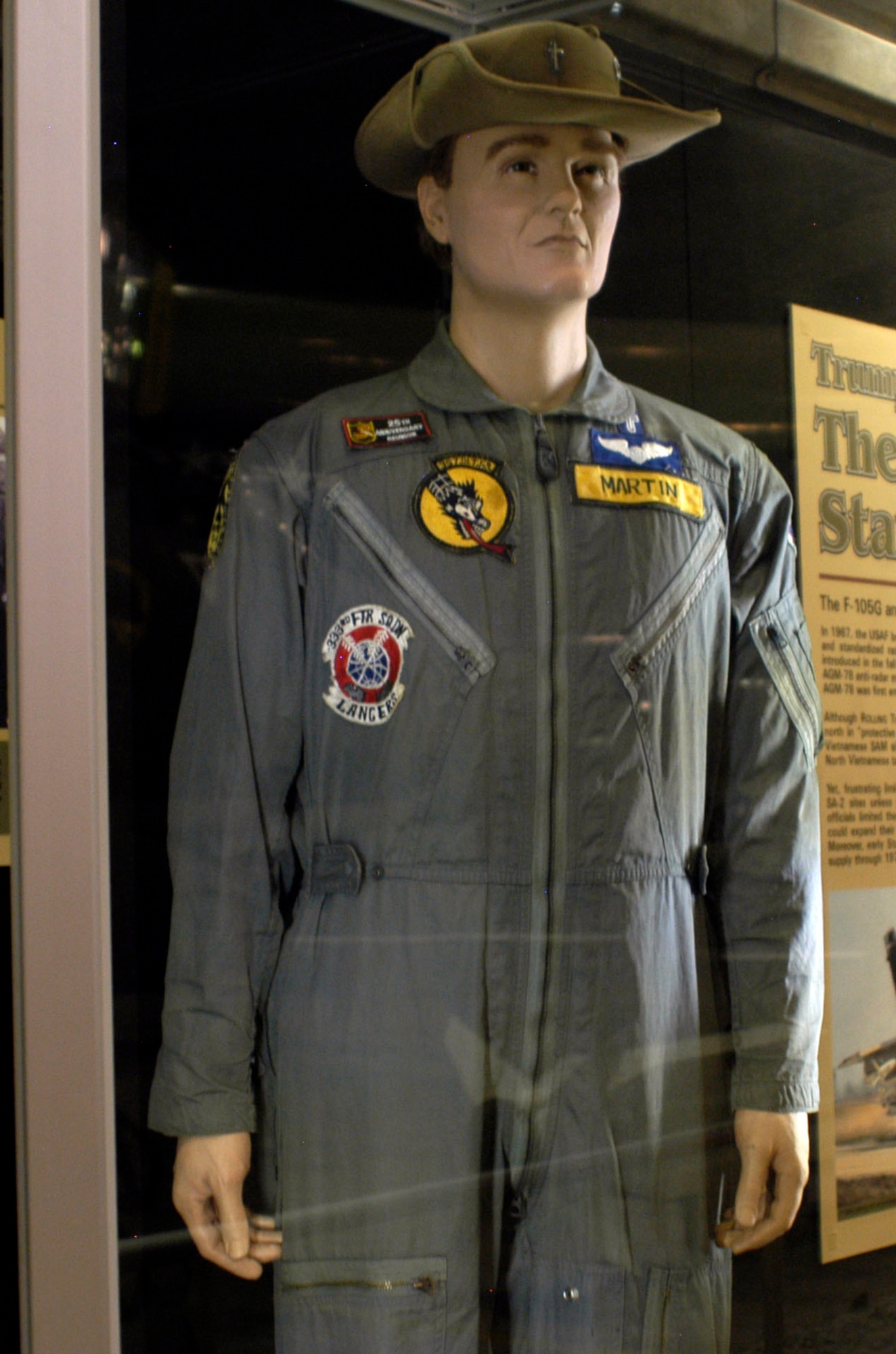 DAYTON, Ohio - Chaplain Chris Martin's K-2B suit worn during his tour at Takhli. It carries the insignia of the 355th TFW's three squadrons, the 333rd Tactical Fighter Squadron (TFS), 354th TFS and 357th TFS. At Takhli, the Wild Weaselds did not fly as a separate squadron. Rather, they were spread out between the three squadrons. (U.S. Air Force photo)