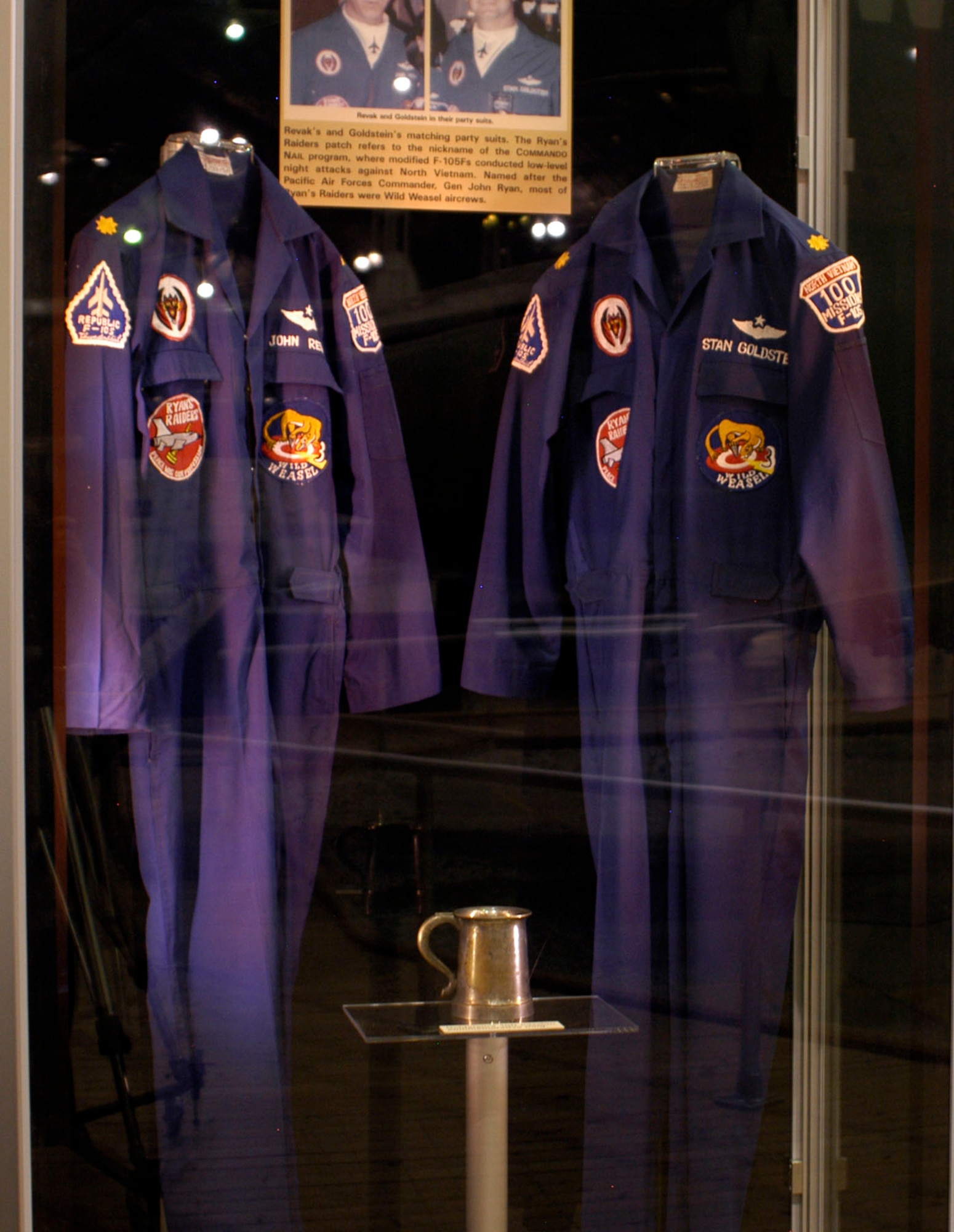 DAYTON, Ohio - Revak's and Goldstein's matching party suits. The "Ryan's Raiders" patch refers to the nickname of the Commando Nail program, where modified F-105Fs conducted low-level night attacks against North Vietnam. Named after the Pacific Air Forces commander, Gen. John Ryan, most of the Ryan's Raiders were Wild Weasel aircrews. These suits are on display in the First In, Last Out: Wild Weasels vs. SAMs exhibit in the Southeast Asia War Gallery at the National Museum of the U.S. Air Force. (U.S. Air Force photo)
