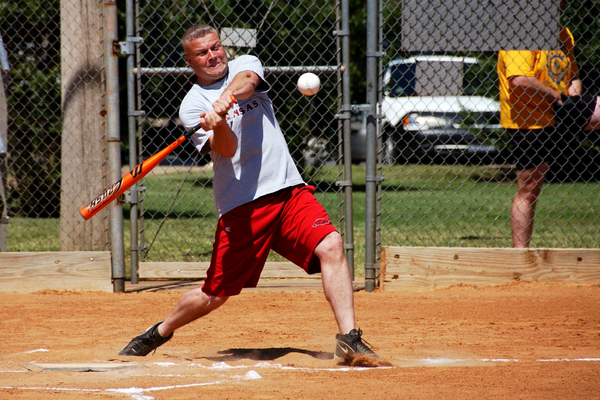 Master Sgt. David Aleshire, 71st Communications Squadron, swings at a pitch in the first inning of the Senior Leadership Softball Classic on base May 29. (U.S. Air Force photo by Staff Sgt. Brian Hill).