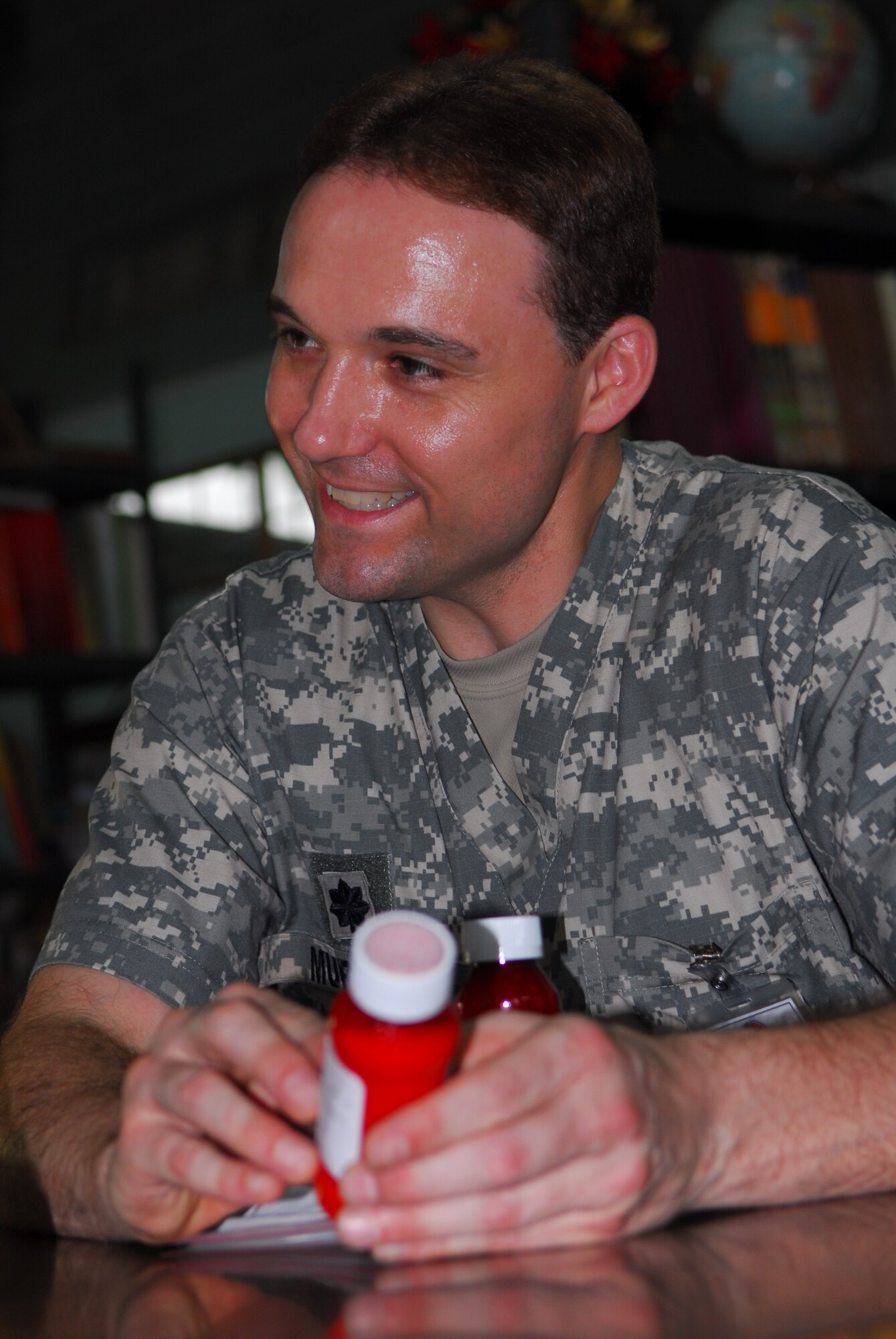 SANTA ROSA, Costa Rica – Lt. Col. Erich Murrell, the 30th Medical Support Squadron commander, helps out around the pharmacy here May 24. Medical personnel from the 30th Space Wing deployed to Costa Rica May 16 - 30 as part of a humanitarian effort with local Costa Rican physicians. Medical specialists from both countries provided medical care to residents who are rarely seen by physicians due to living in isolated areas. (U.S. Air Force photo/Airman 1st Class Steve Bauer) 
