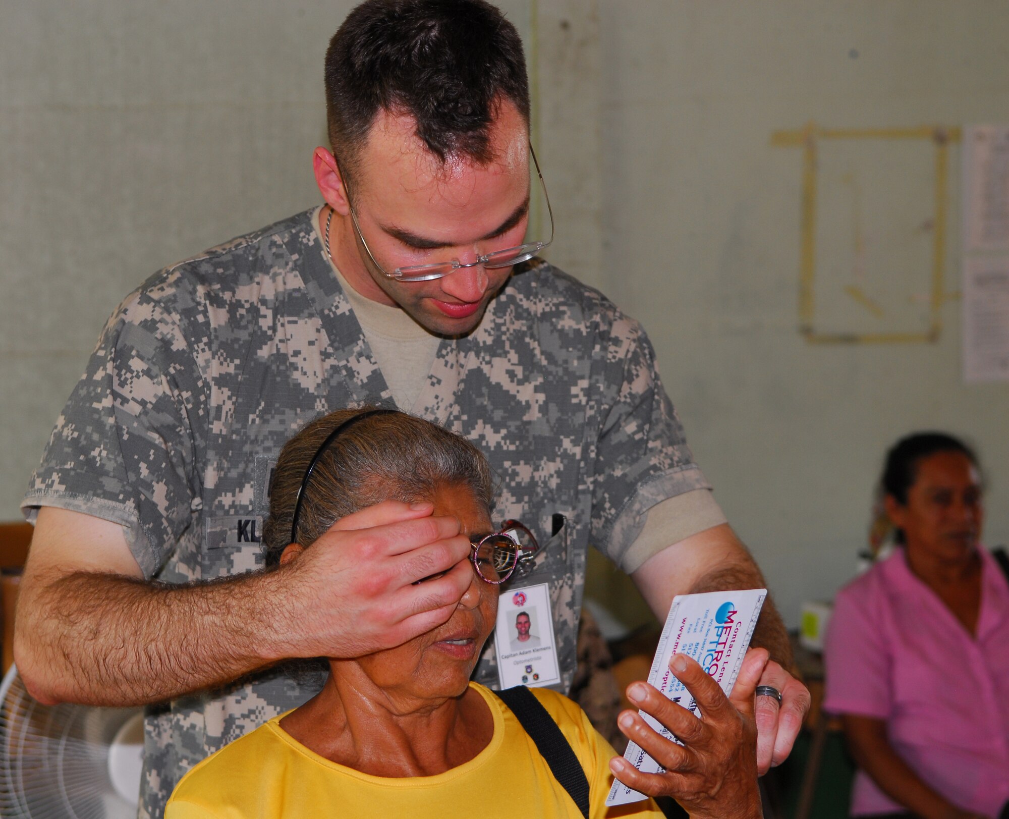 NORTHERN PROVINCE OF ALAJUELA, Costa Rica – Covering the patient's right eye, Capt. Adam Klemens, a 30th Medical Operations Squadron optometrist, tests the short range vision of a local resident here May 21. Medical personnel from the 30th Space Wing deployed to Costa Rica May 16 - 30 as part of a humanitarian effort with local Costa Rican physicians. Medical specialists from both countries provided medical care to residents who are rarely seen by physicians due to living in isolated areas. (U.S. Air Force photo/Airman 1st Class Steve Bauer) 