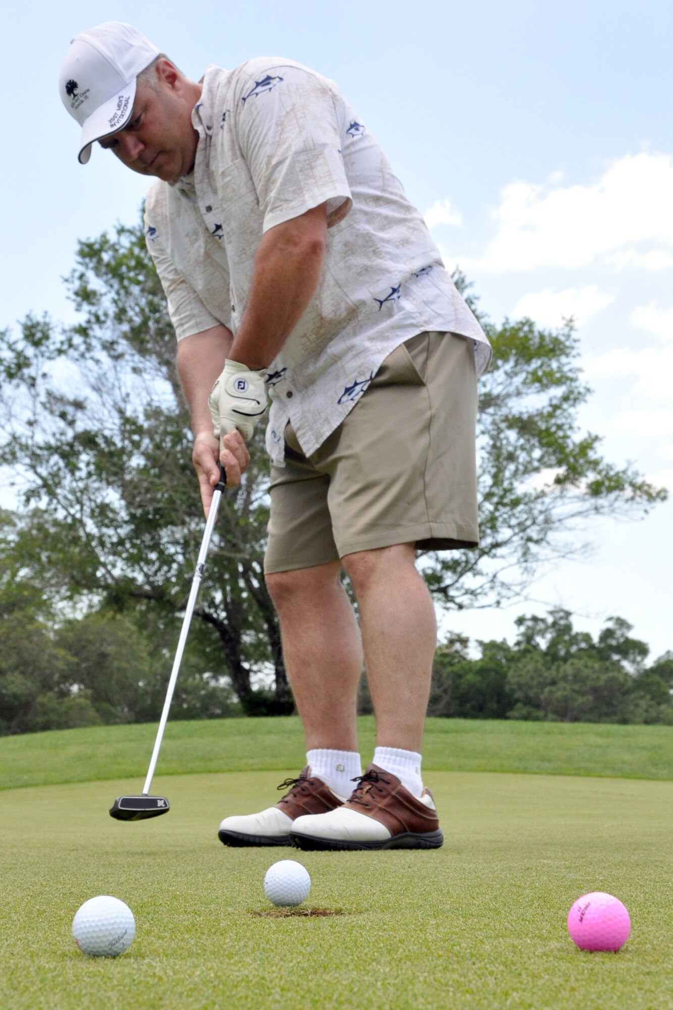 EGLIN AIR FORCE BASE, Fla. – Bernie DeLong makes par during a golf tournament at the Eglin Golf Course May 29. The tournament was a fundraiser to support the Hearts Apart Dining program, a program that offers free dining to the families of deployed servicemembers. The goal for the event, led by the First Sergeant’s Council, was to raise $4,000 with 100 percent of the proceeds going to the program. More than 115 people participated in the tournament. (U.S. Air Force photo/ Airman Anthony Jennings)