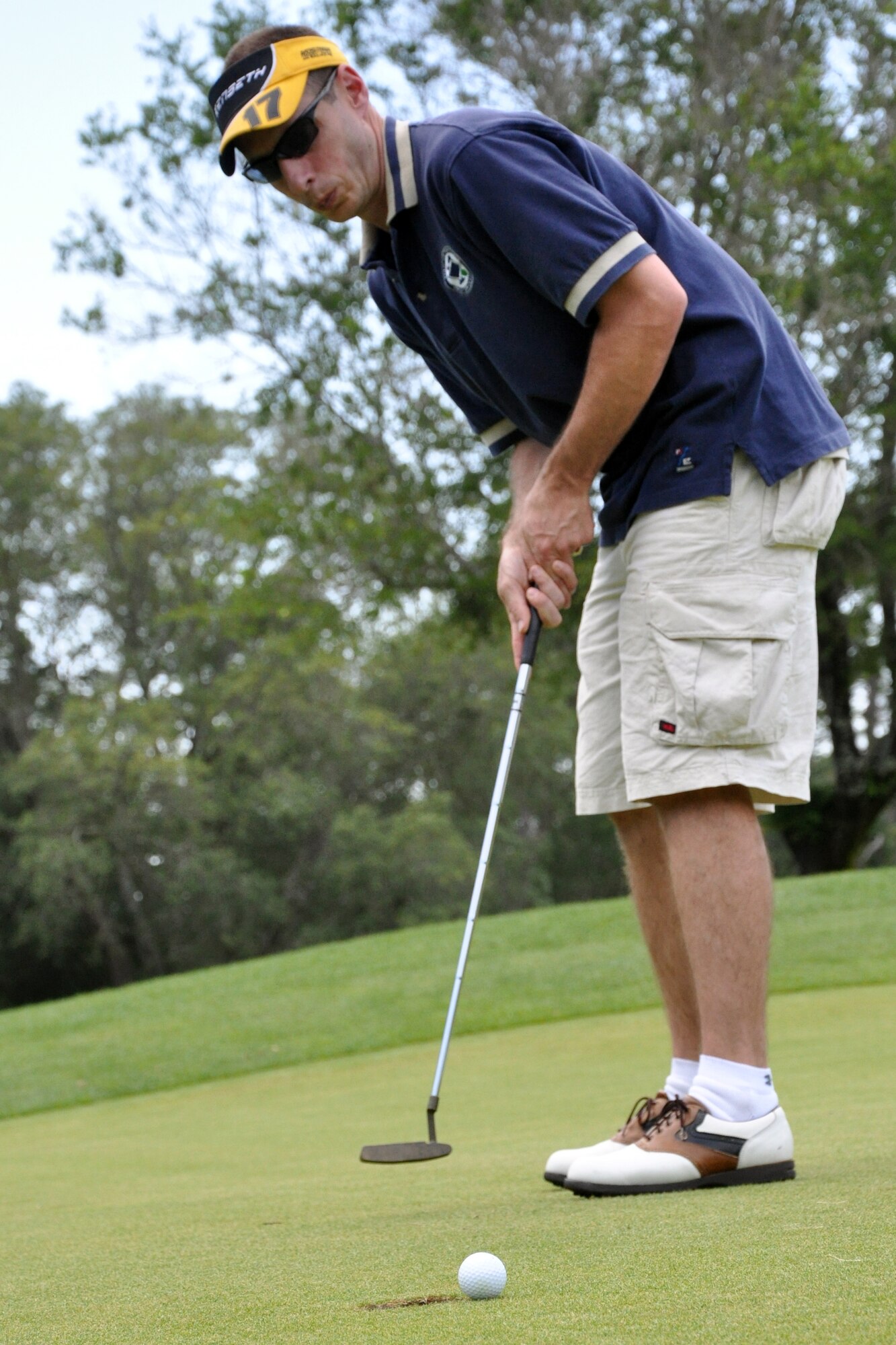 EGLIN AIR FORCE BASE, Fla. – Master Sgt. Andrew Lewis, 96th Aero Medical Dental Squadron, putts the ball during a golf tournament at the Eglin Golf Course May 29. The tournament was a fundraiser to support the Hearts Apart Dining program, a program that offers free dining to the families of deployed servicemembers. The goal for the event, led by the First Sergeant’s Council, was to raise $4,000 with 100 percent of the proceeds going to the program. More than 115 people participated in the tournament. (U.S. Air Force photo/ Airman Anthony Jennings)