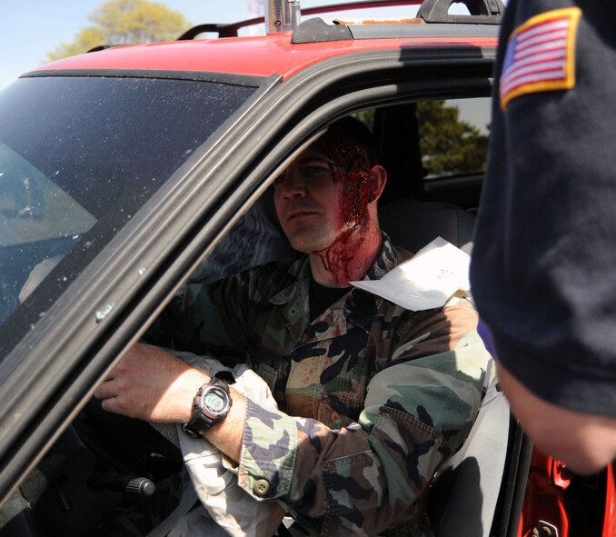 Maj. Scott Williams is treated by members of the Westhampton Beach Ambulance during the mock accident demonstration on F.S. Gabreski Airport (ANG) on May 20, 2009. The event was part of the 101 Critical Days of Summer.

(U.S. Air Force Photo/Staff Sgt. David J. Murphy)