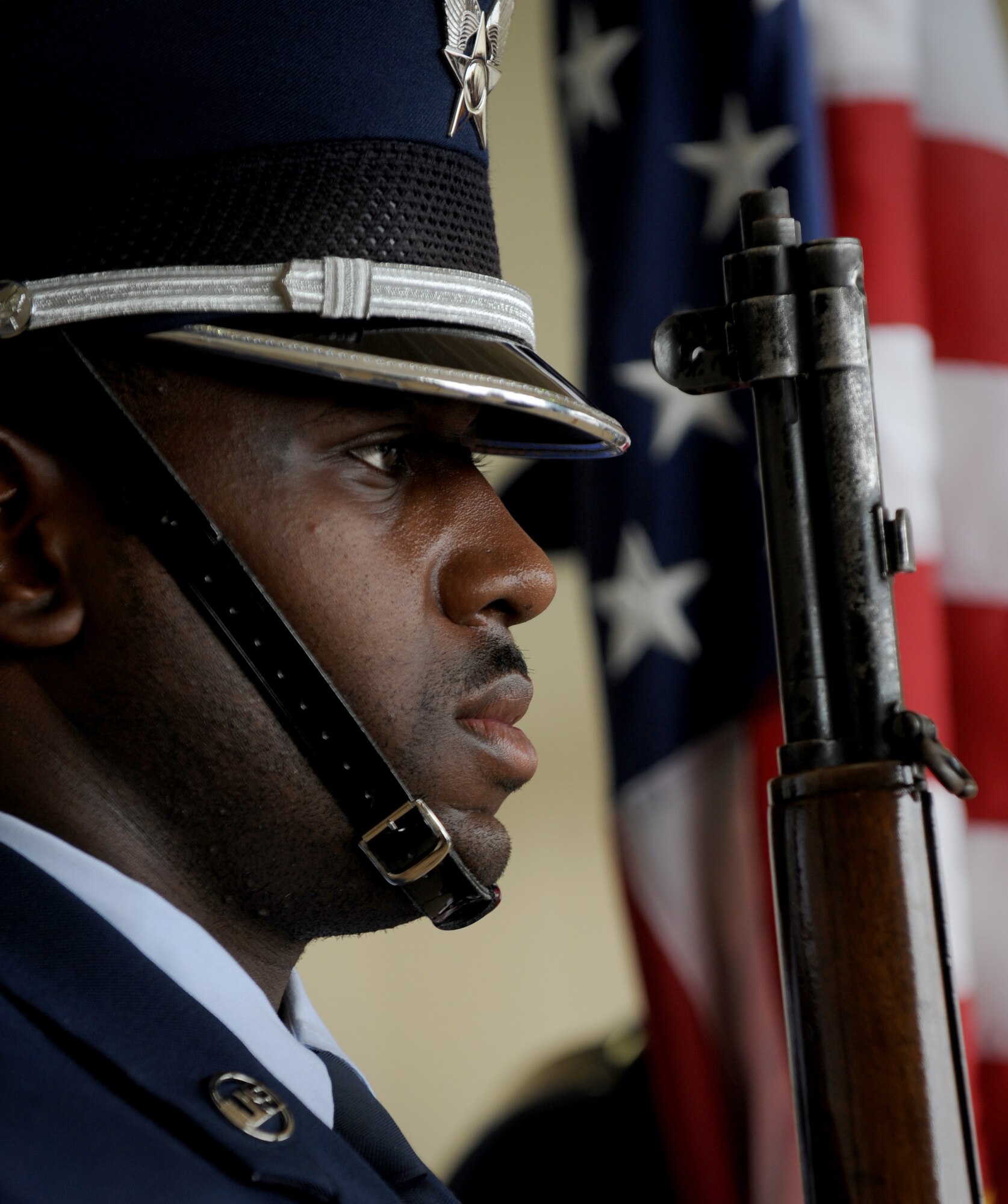 MOODY AIR FORCE BASE, Ga. -- A member of the Moody Air Force Base Honor Guard presents the colors during the 23rd Wing change of command ceremony held here May 28. During the ceremony Col. Gary Henderson assumed command of the 23rd WG. (U.S. Air Force photo by Senior Airman Gina Chiaverotti)