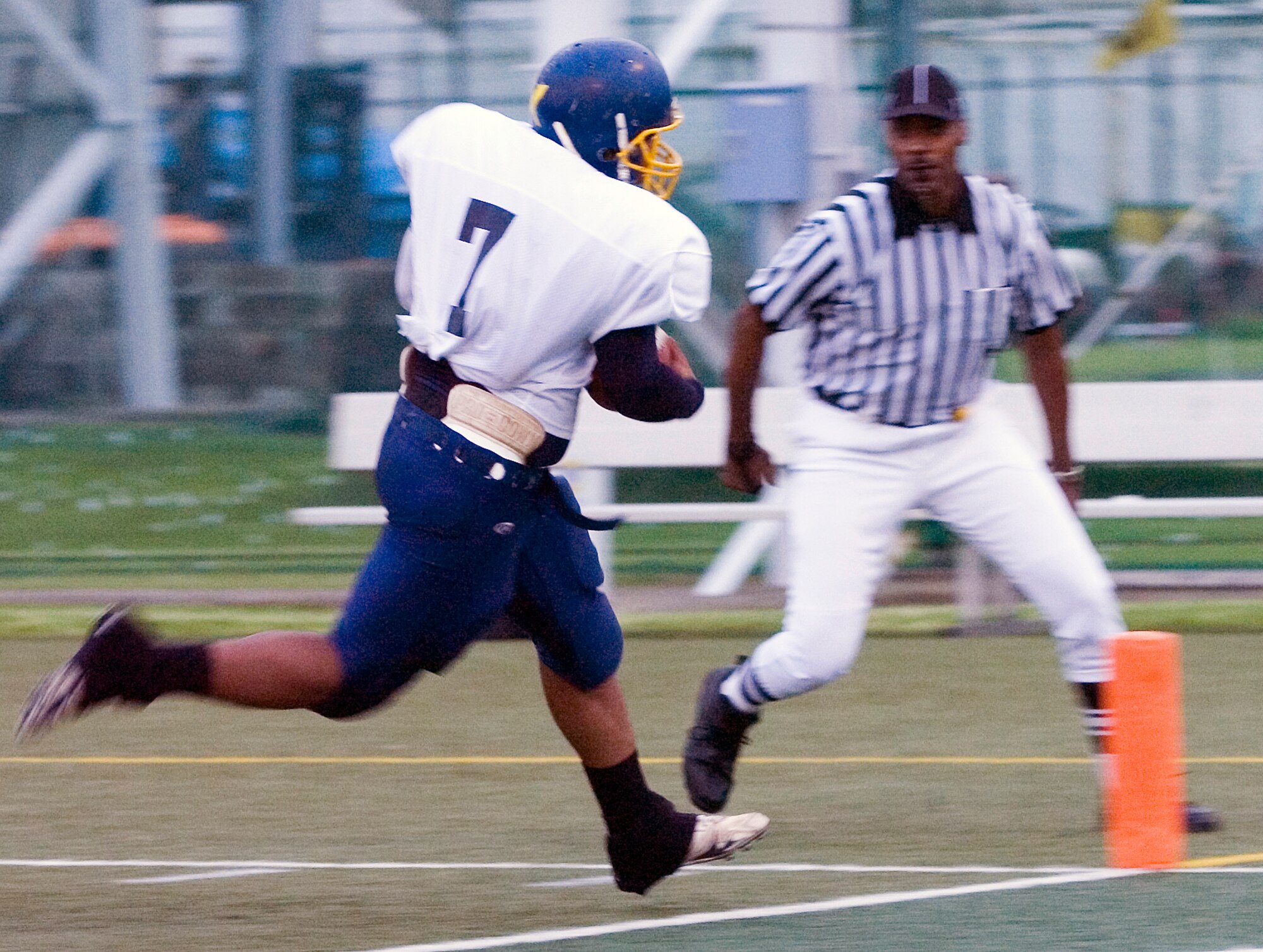 YOKOSUKA NAVAL BASE, Japan -- Yokota quarterback Ryan Jones scores the first touchdown of the game from nine yards out during Yokosuka's 41-12 win over the Warriors May 30 in U.S. Forces Japan-American Football League action. Jones had 135 yards passing, including a 15-yard scoring toss to wide out Frederick Guild. The Warriors' final two home games at Bonk Field are set for 5 p.m. June 6 vs. Misawa and 4 p.m. June 27 vs. Kadena. (U.S. Air Force photo/Master Sgt. Matt Summers)
