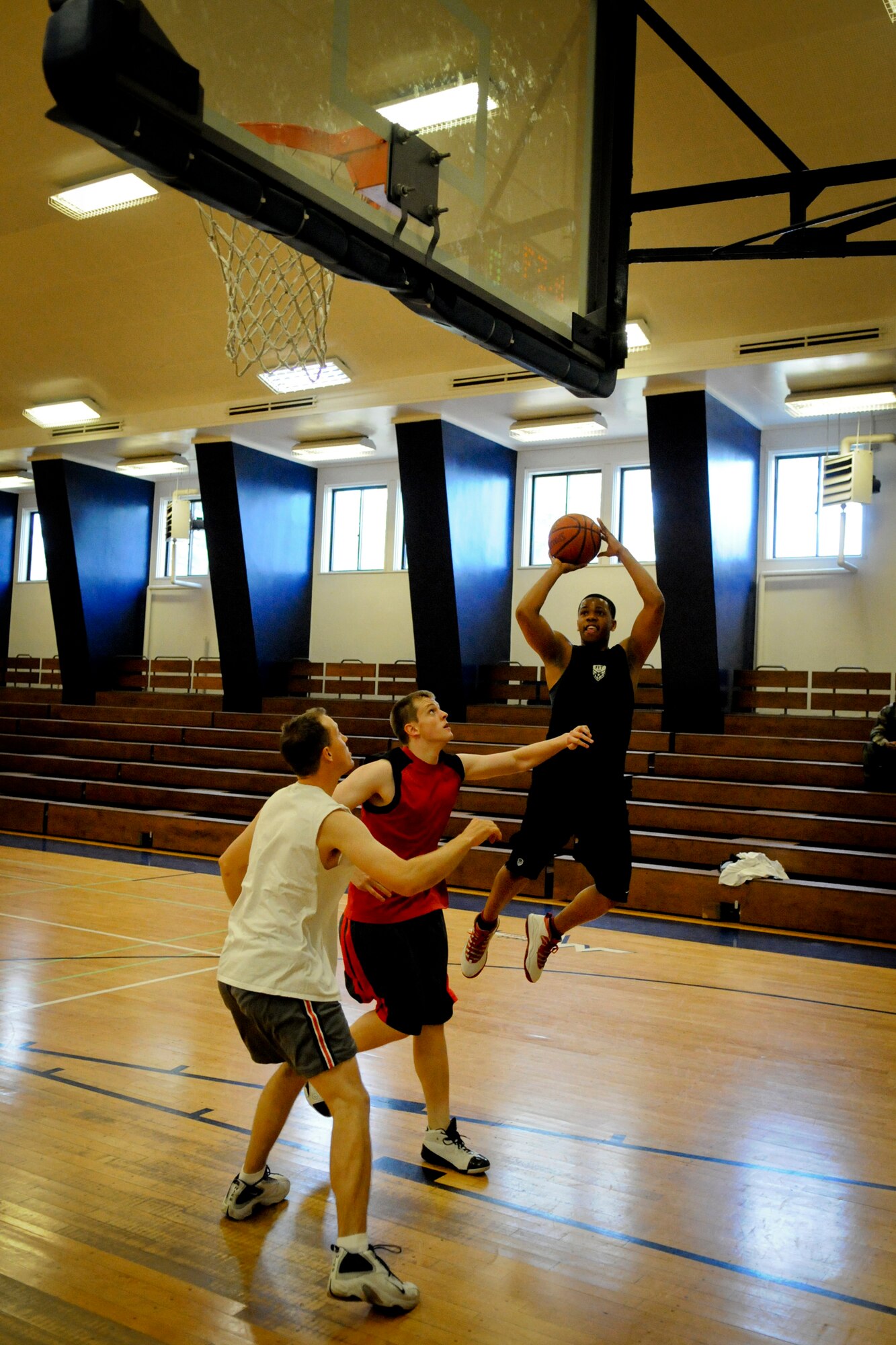 MISAWA AIR BASE, Japan -- Gregory Richardson attempts a jump shot during a 3-on-3 basketball tournament at the Potter Fitness Center May 27, 2009. The tournament was one of the many events hosted by the Potter Fitness Center during May Fitness Month. (U.S. Air Force photo by Senior Airman Jamal D. Sutter)