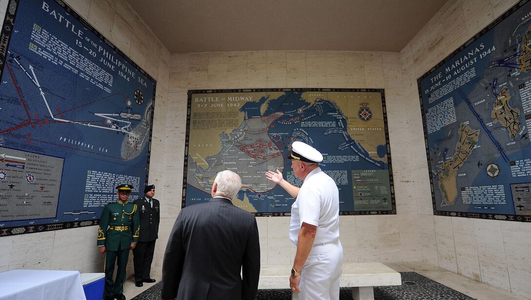 U.S. Defense Secretary Robert M. Gates receives a tour of the Manila American Cemetery and Memorial in the Philippines by Larry Adkison, superintendent American Military Cemetery Philippines, in Manila, Philippines, June 1, 2009. 
