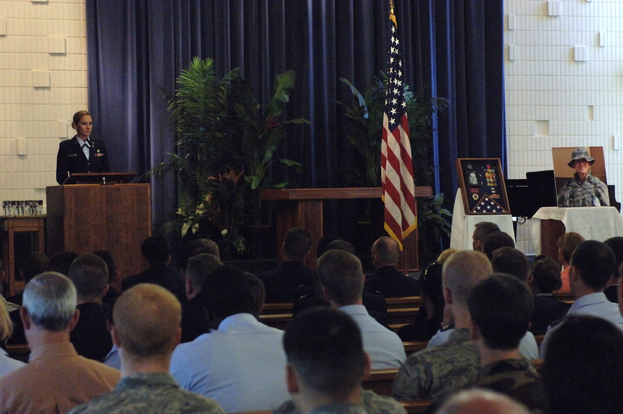 HICKAM AIR FORCE BASE, Hawaii?Hundreds of Airmen and friends attend a memorial service here June 2 at the Hickam Chapel in honor of 1st Lt.  Roslyn Schulte. Lieutenant Schulte died on May 20 from an improvised explosive device while deployed to Afghanistan in support of Operation Enduring Freedom. Lieutenant Schulte, who was assigned to the 613th Air and Space Operations Center, 13th Air Force here,  is a native of St. Louis, Mo., and is survived by her parents Mr. Robert and Susie Schulte, and brother Todd Schulte. (U.S. Air Force photo/ by Oscar A. Hernandez)