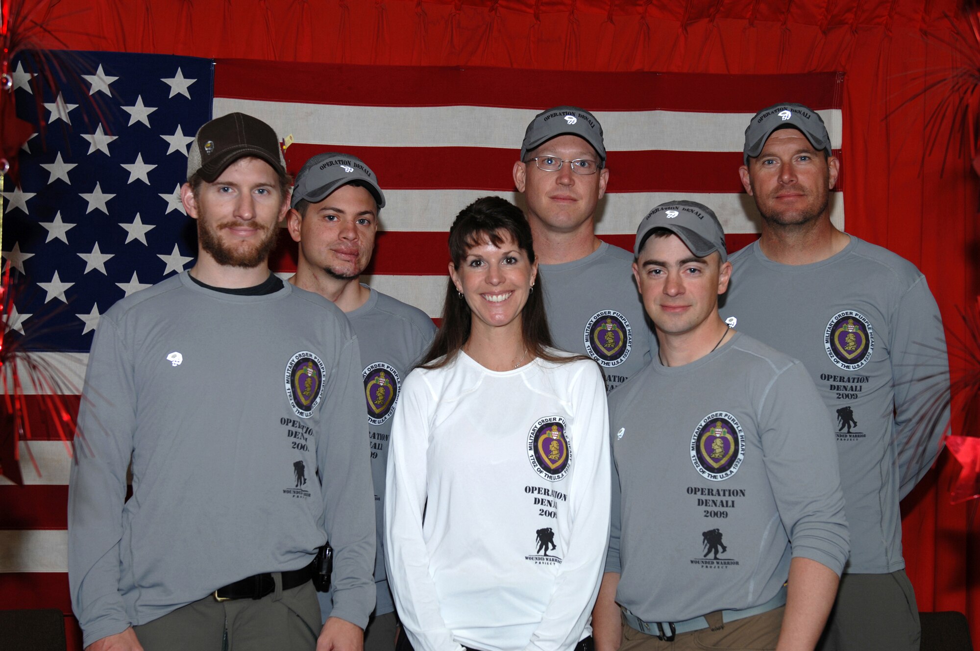 ANCHORAGE, Alaska -- Dave Shebib, Jon Kuniholm, Bob Haines (back row, left to right), Matt Nyman, Gayle Hoffmeister and Army Lt. Col. Marc Hoffmeister, Alaskan Command Joint Task Force-Alaska Engineering Division chief (front row left to right) make up the Operation Denali team. Operation Denali is enabling wounded warriors to overcome combat injuries by climbing Mount McKinley, North America's highest peak, while symbolizing the strength of the nation and its defenders. (U.S. Air Force photo/Tech. Sgt. Brian Smith)