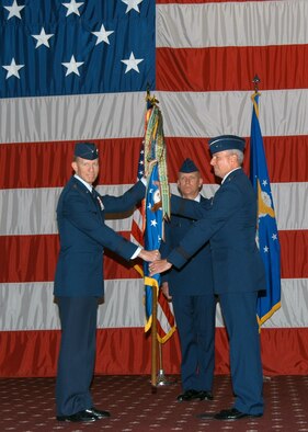 Maj. Gen. Floyd L. Carpenter, receives the Eighth Air Force flag from Gen. John D.W. Corley, commander of Air Combat Command, as he assumes command of Eighth Air Force (Air Forces Strategic) June 1. (U.S. Air Force Photo/Maj. Richard Komurek)