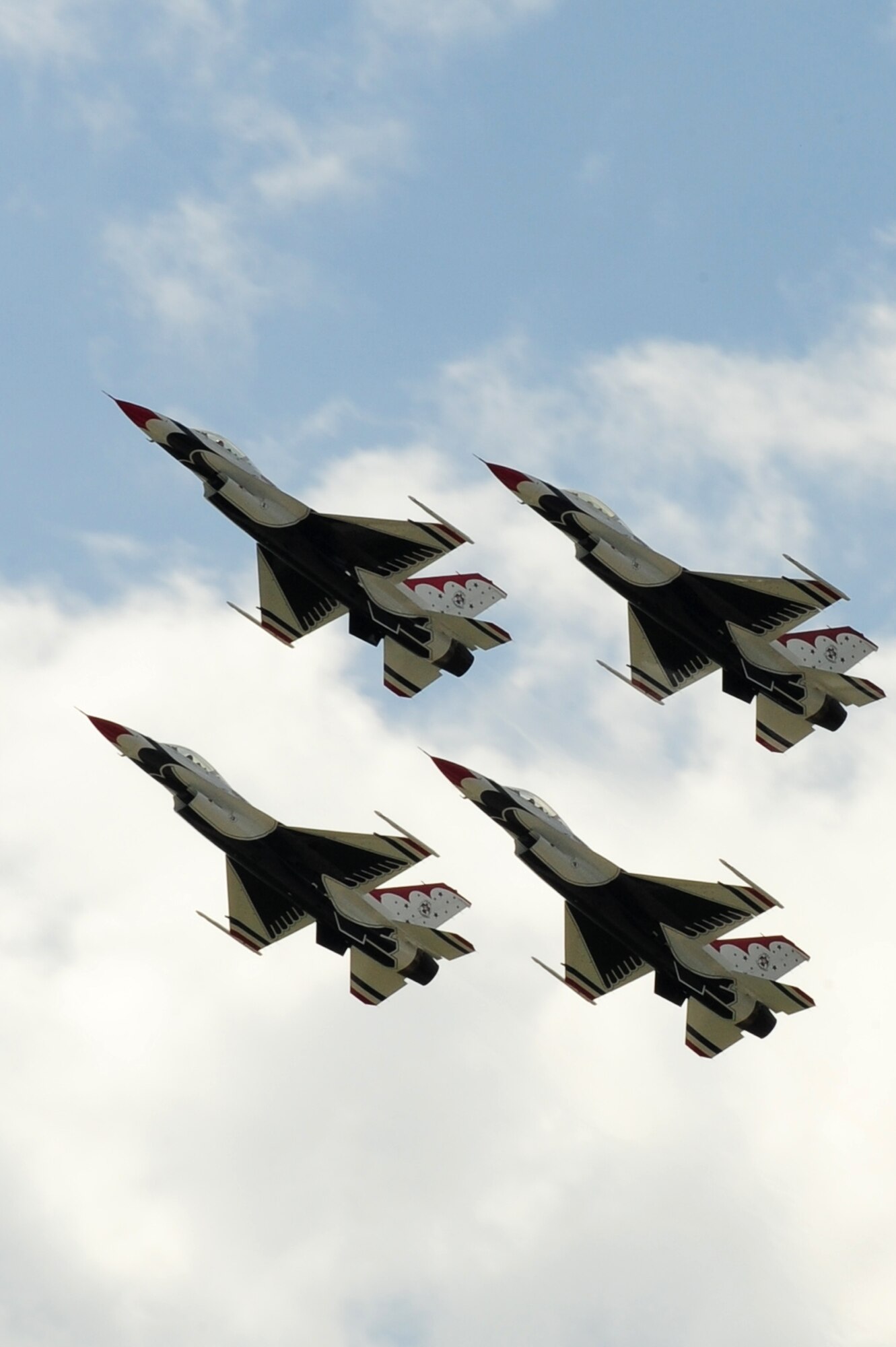 Thunderbirds No. 1 through 4, take off in a diamond formation during the 2009 Dakota Thunder open house and air show here, May 30.  The Thunderbirds are scheduled to perform in more than 70 shows in the United States, Puerto Rico and the Far East. (U.S. Air Force photo/Senior Airman Anthony Sanchelli)