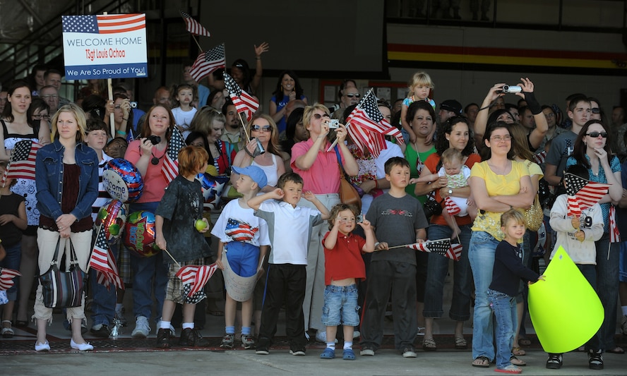 Friends and family await the homecoming of the nearly 300 Airmen from the 419th and 388th Fighter Wings who returned to Hill Air Force Base, Utah, after a four-month deployment in support of Operation Iraqi Freedom May 28. (U.S. Air Force photo/Staff Sgt. Kyle Brasier)