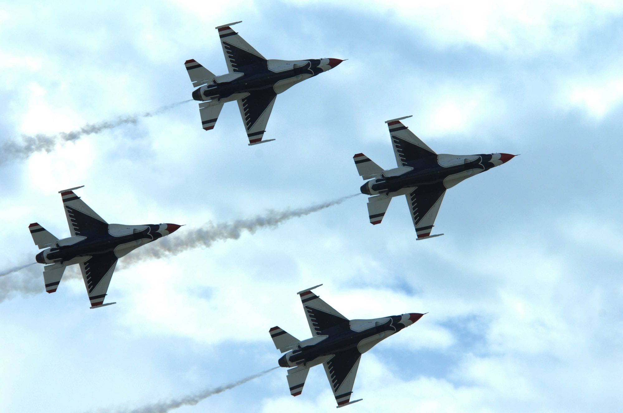 Four U.S. Air Force Thunderbirds F-16 Fighting Falcons fly in formation here, during the Dakota Thunder open house and air show May 30. The act was one of many displays showcased for more than 40,000 people in attendance at the two-day air show. (U.S. Air Force photo by Airman 1st Class Corey Hook)