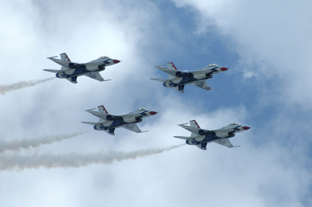 Four U.S. Air Force Thunderbirds F-16 Fighting Falcons fly in formation here, during the Dakota Thunder open house and air show, May 30. The act was one of many displays showcased for more than 40,000 people in attendance at the two-day air show. (U.S. Air Force photo by Airman 1st Class Corey Hook)
