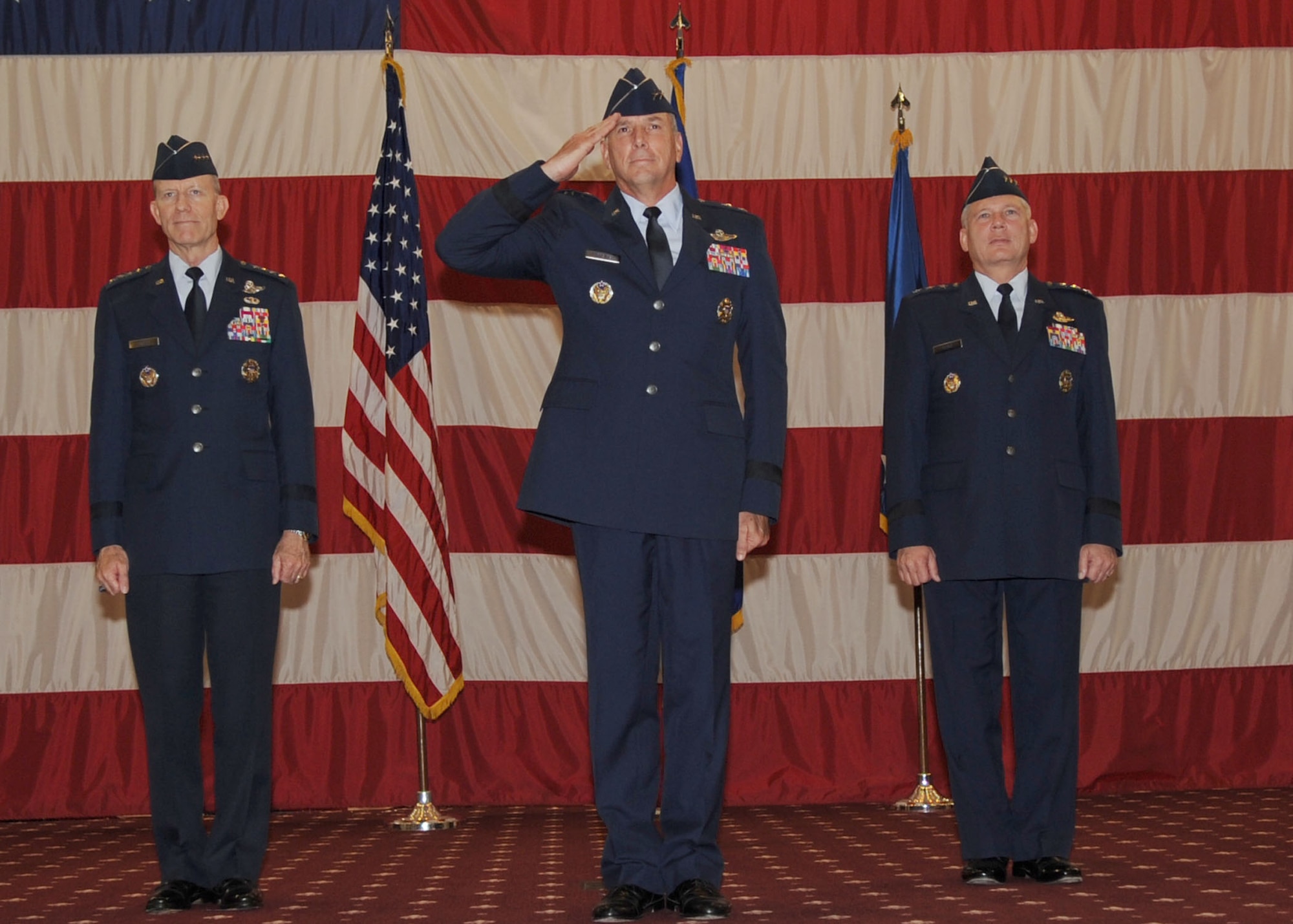 Maj. Gen. Floyd L. Carpenter, commander of the Eighth Air Force (Air Forces Strategic), renders his first salute to the troops after assuming command of “The Mighty Eighth” Air Force from Lt. Gen. Robert J. Elder Jr. Presiding over the June 1 ceremony was Gen. John D.W. Corley, commander of Air Combat Command. (U.S. Air Force photo/Senior Airman Alexandra Sandoval)