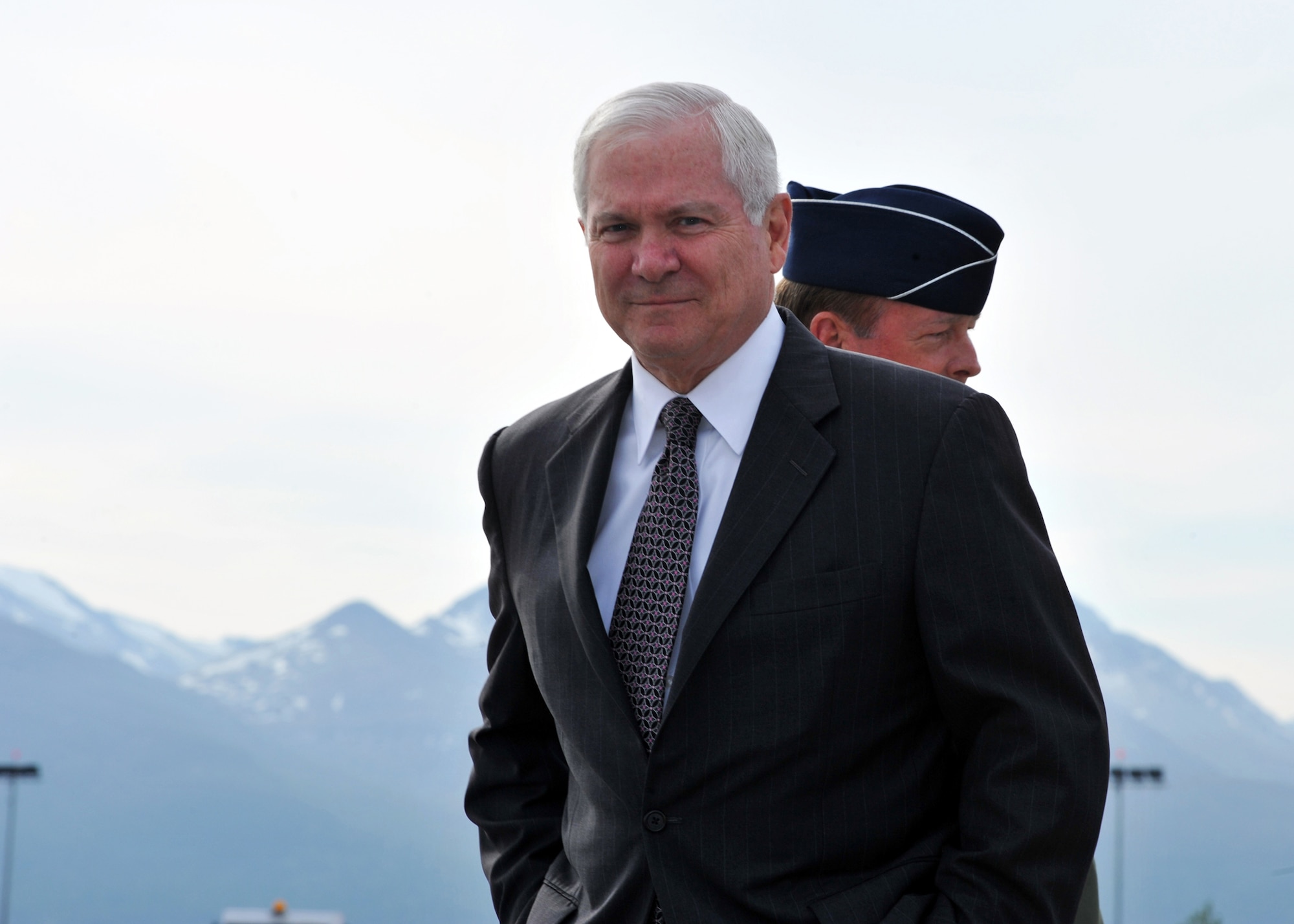 ELMENDORF AIR FORCE BASE, Alaska -- Secretary of Defense Robert M. Gates arrives with a smile June 1, 2009. Secretary Gates visited Elmendorf to discuss how the war is affecting this base and servicemembers' everyday lives. (U.S. Air Force/Senior Airman Laura Turner)